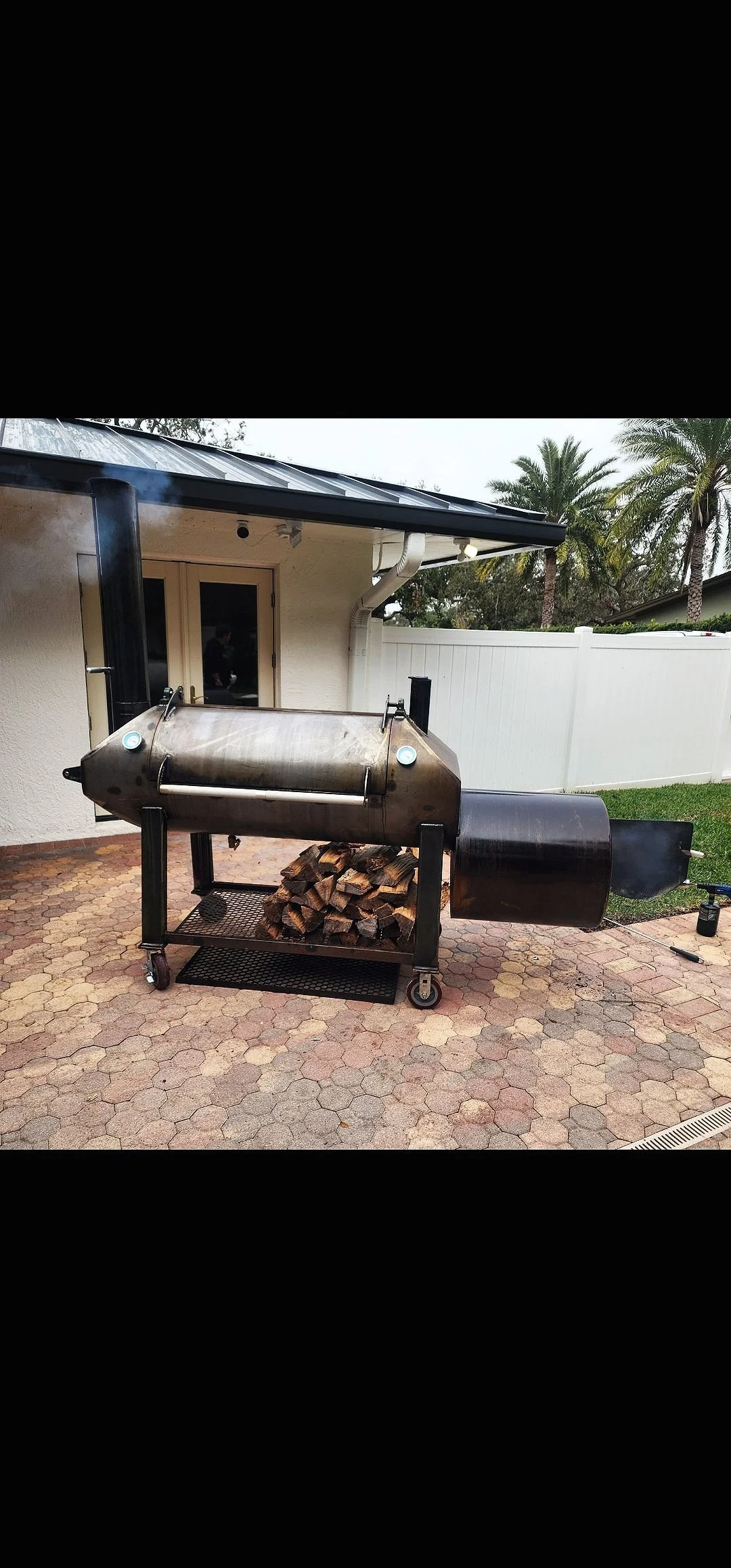 Offset smoker in backyard setup – The Evolution by Superior Smokers delivering real wood-fired barbecue flavor