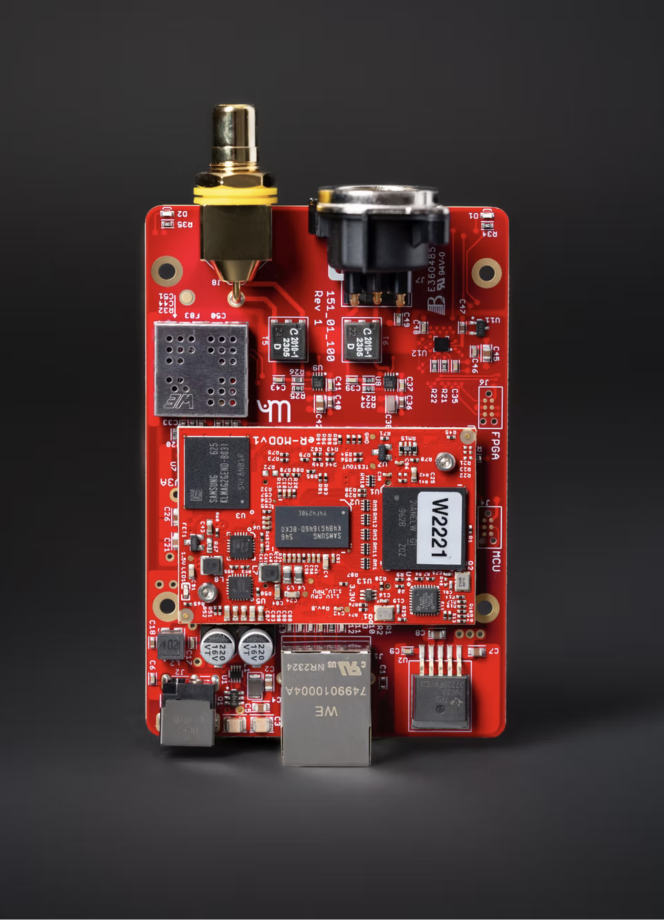 Exposed circuit board of the Wattson Emerson DIGITAL network bridge, showing the FPGA processing module, Ethernet connection, digital audio outputs, and internal components.
