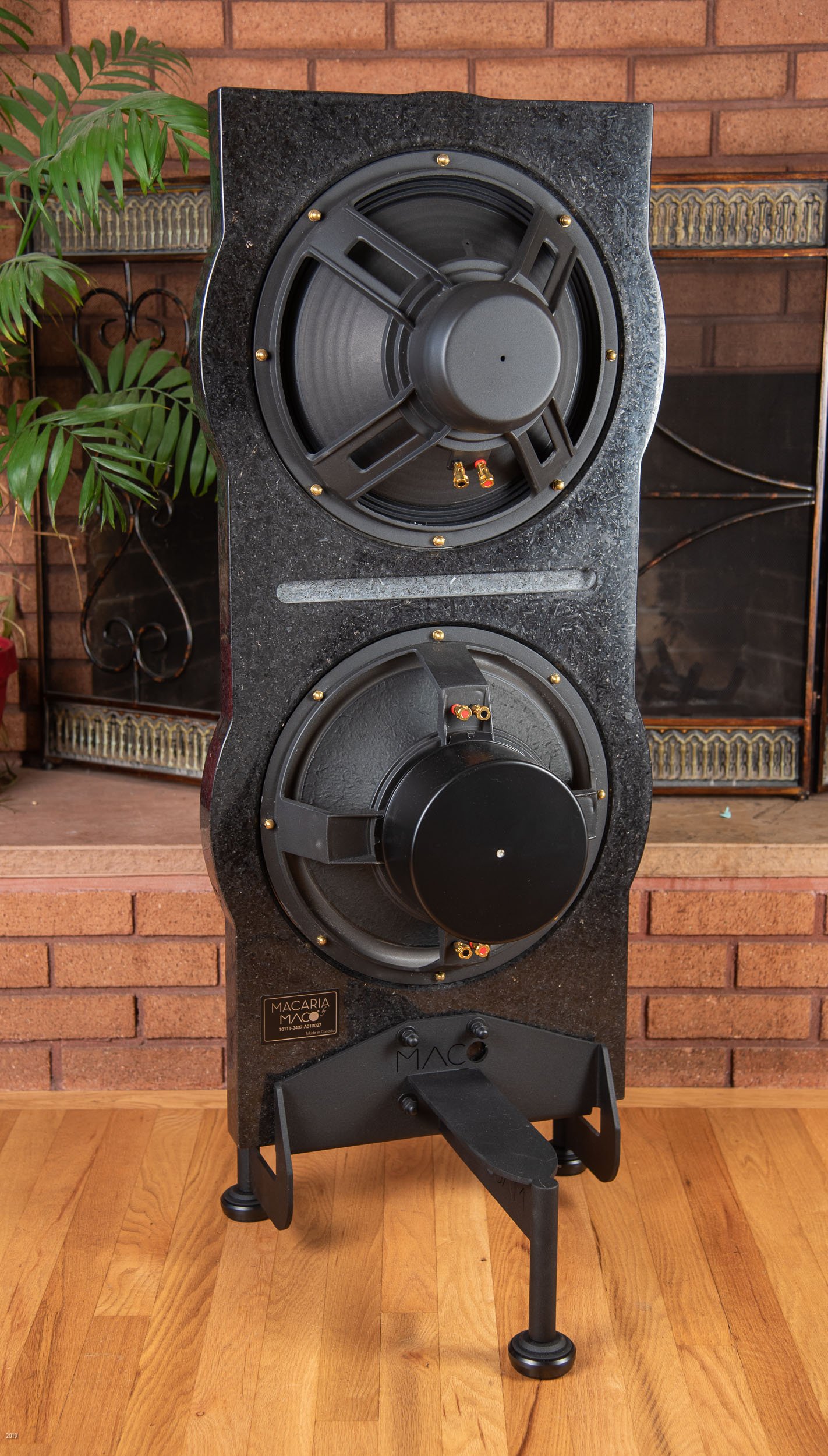 Rear view of the granite Macarias showing the open baffle design, and magnet structures of the full range and woofer drivers