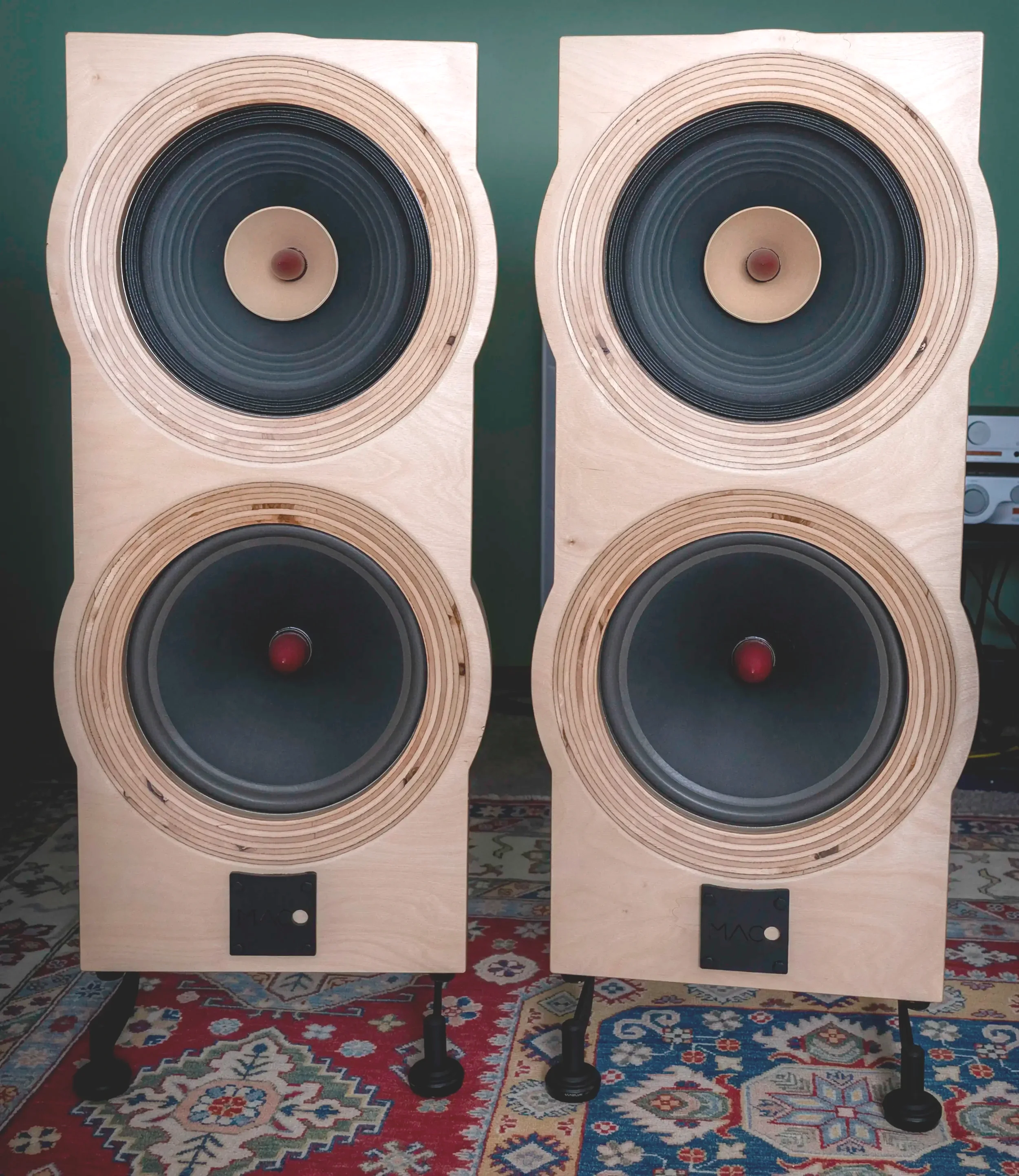 Pair of Maco Macarias open-baffle loudspeakers in Baltic birch, showing their 15-inch wideband drivers and 15-inch woofers.