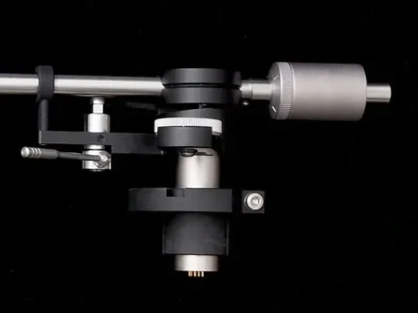 Close-up of the Korf TA-SF9R tonearm bearing assembly, mounting shaft, queue lever, and stainless-steel arm tube.