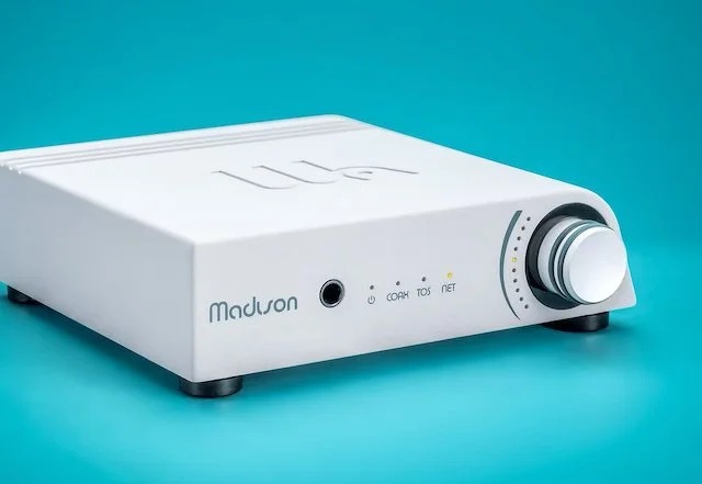 Wattson Madison network streamer in light gray, shown from the front at a three-quarter angle.
