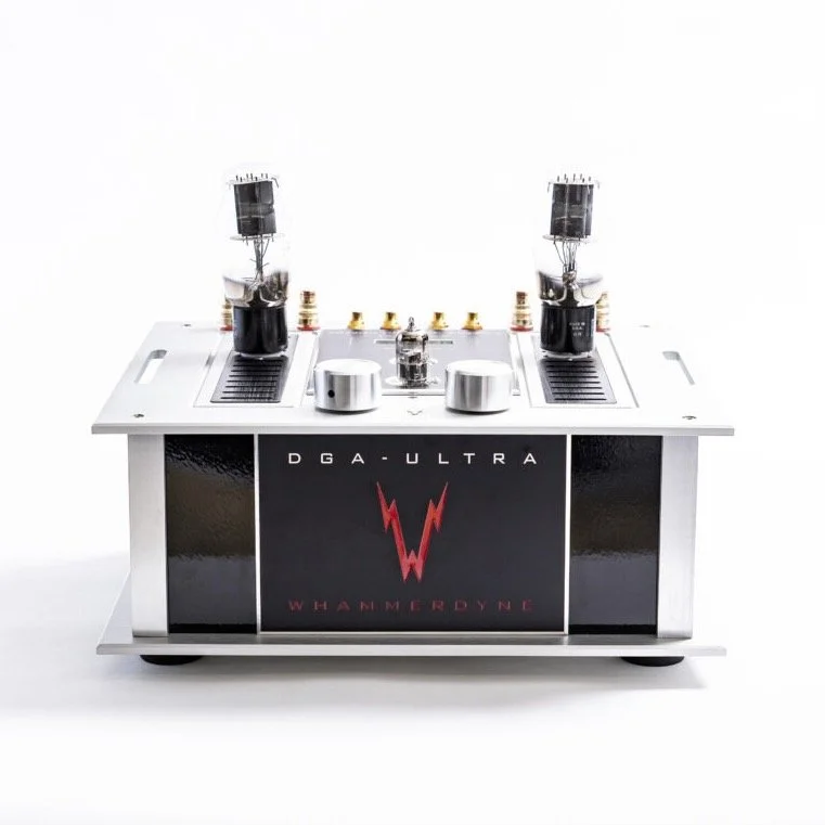 Whammerdyne DGA stereo amplifier, shown in brushed aluminum and black chassis with exposed vacuum tubes and signature red “W” logo on front panel.