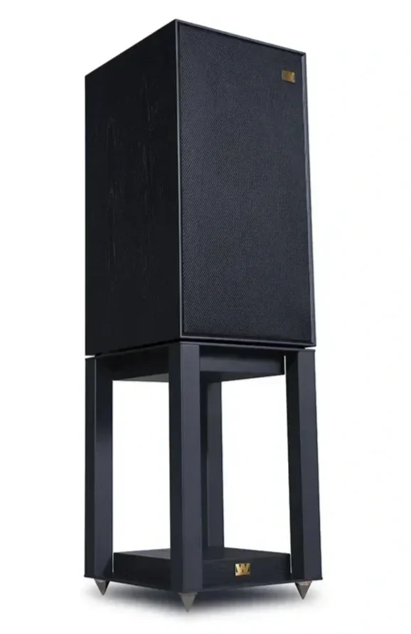 Wharfedale Linton 85 in Black Oak finish with the grille installed on its matching stand, shown from a front three-quarter angle.