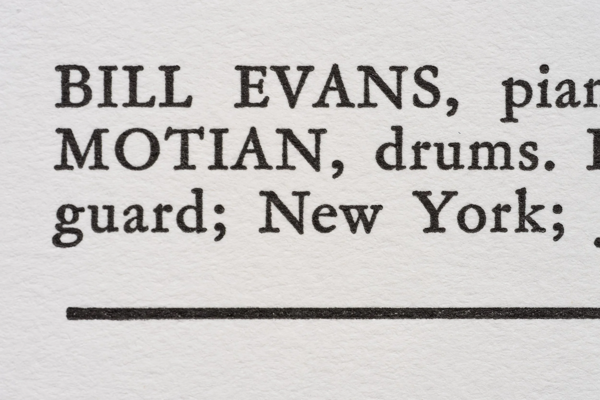 Closeup of type set-back cover text showing Bill Evans name and textural detail of ink applied to paper.