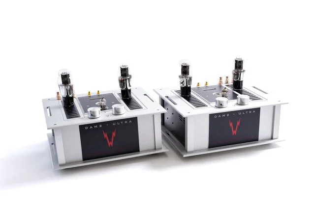 Whammerdyne DAM Ultra mono amplifiers, pair shown in brushed aluminum chassis with enclosed transformers, exposed vacuum tubes, and signature red “W” logo on the front panels.