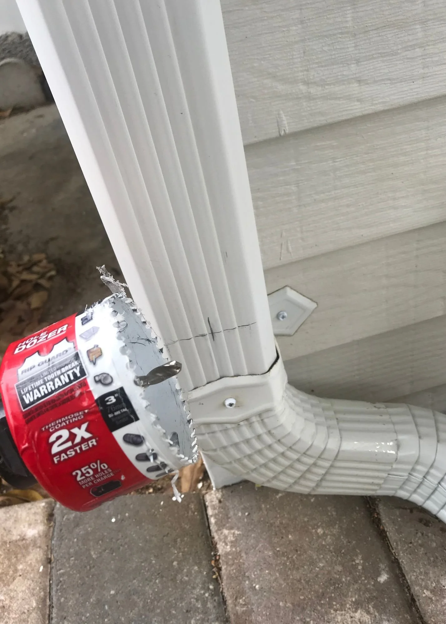 DIY cutting a hole on you gutter to catch & repurpose rainwater