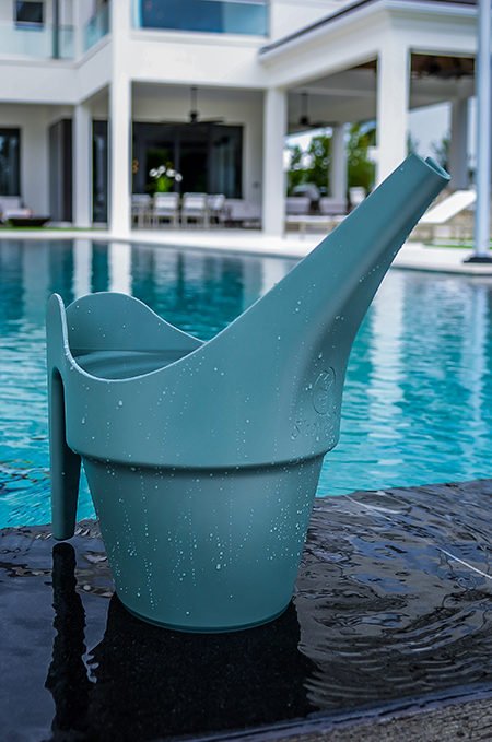 Green residential recycling bin for outdoor water recycling