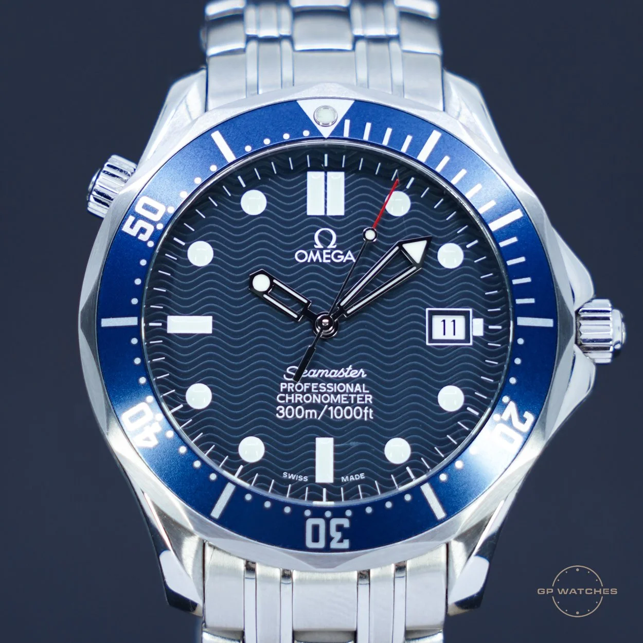 Omega Seamaster Professional Chronometer diving watch with a blue bezel and dial, displaying the date and water resistance to 300 meters.