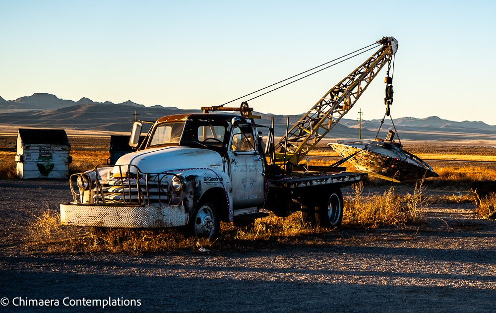 Tow truck and Flying Saucer at the Little A'le'Inn