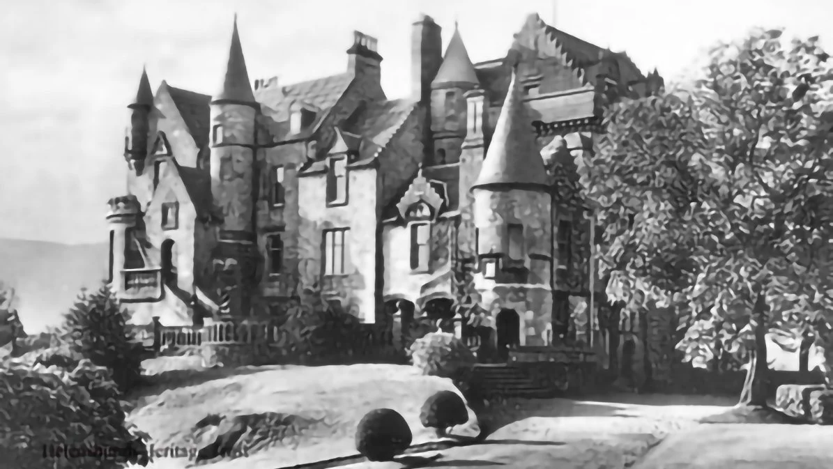 A large, old castle with tall, pointed towers surrounded by trees and bushes, with a stone wall and steps leading to the entrance.