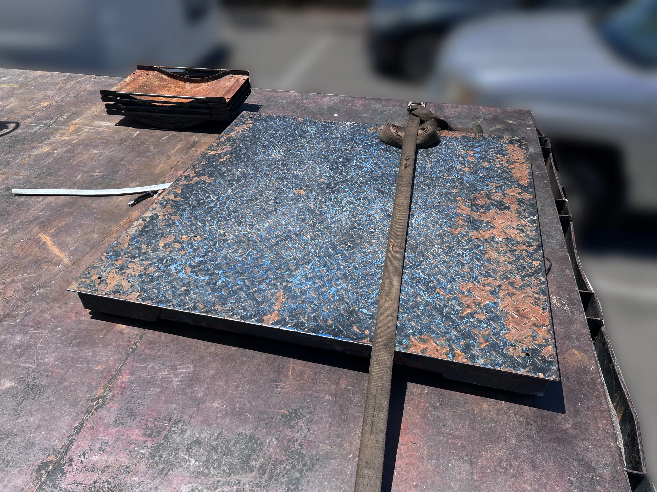 Close-up of JVA Mobile Recycling truck scale showing scrap metal scale.
