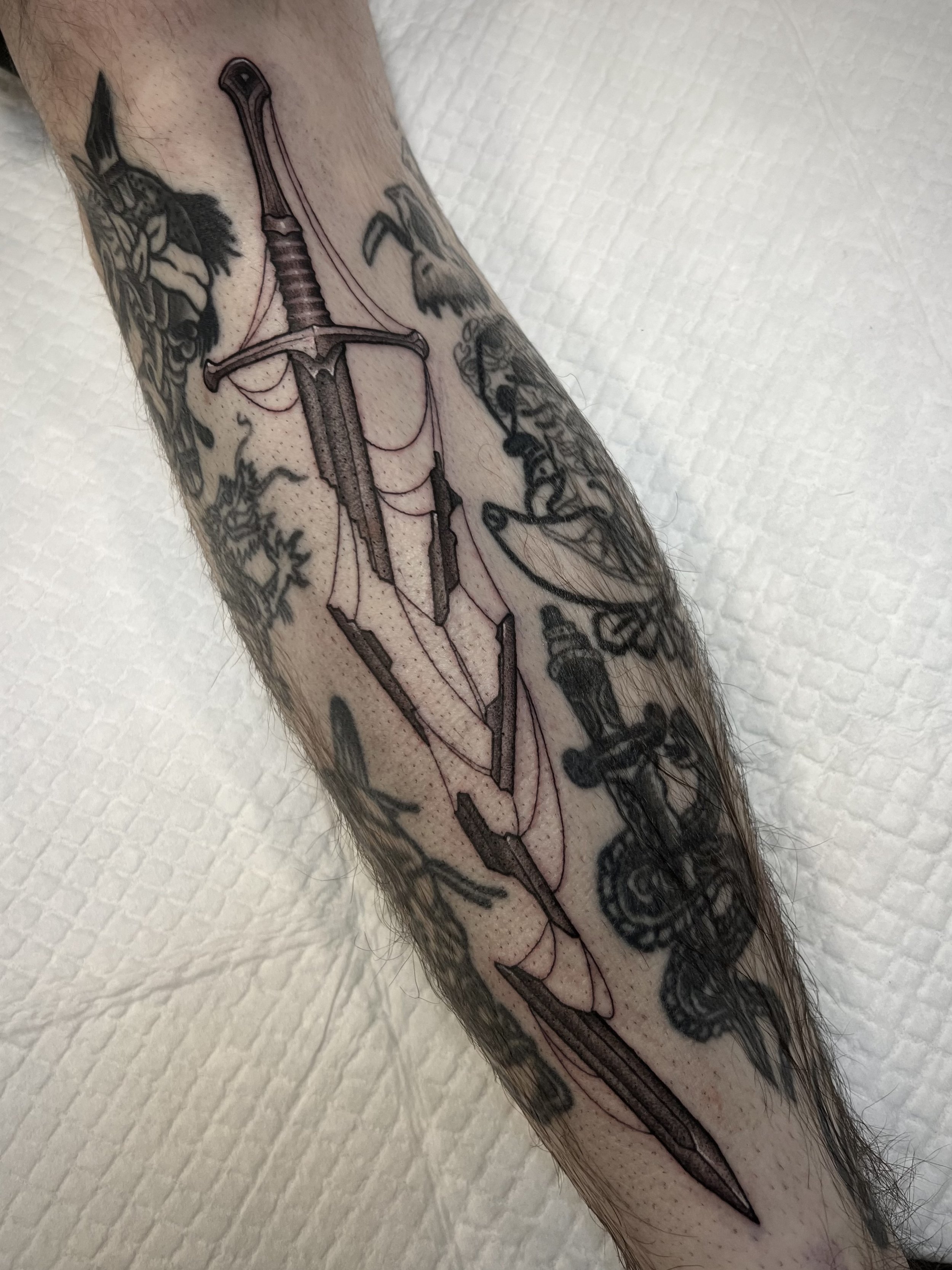 seattle renton tacoma bellevue neotraditional illustrative black and grey lord of the rings lotr narsil tattoo