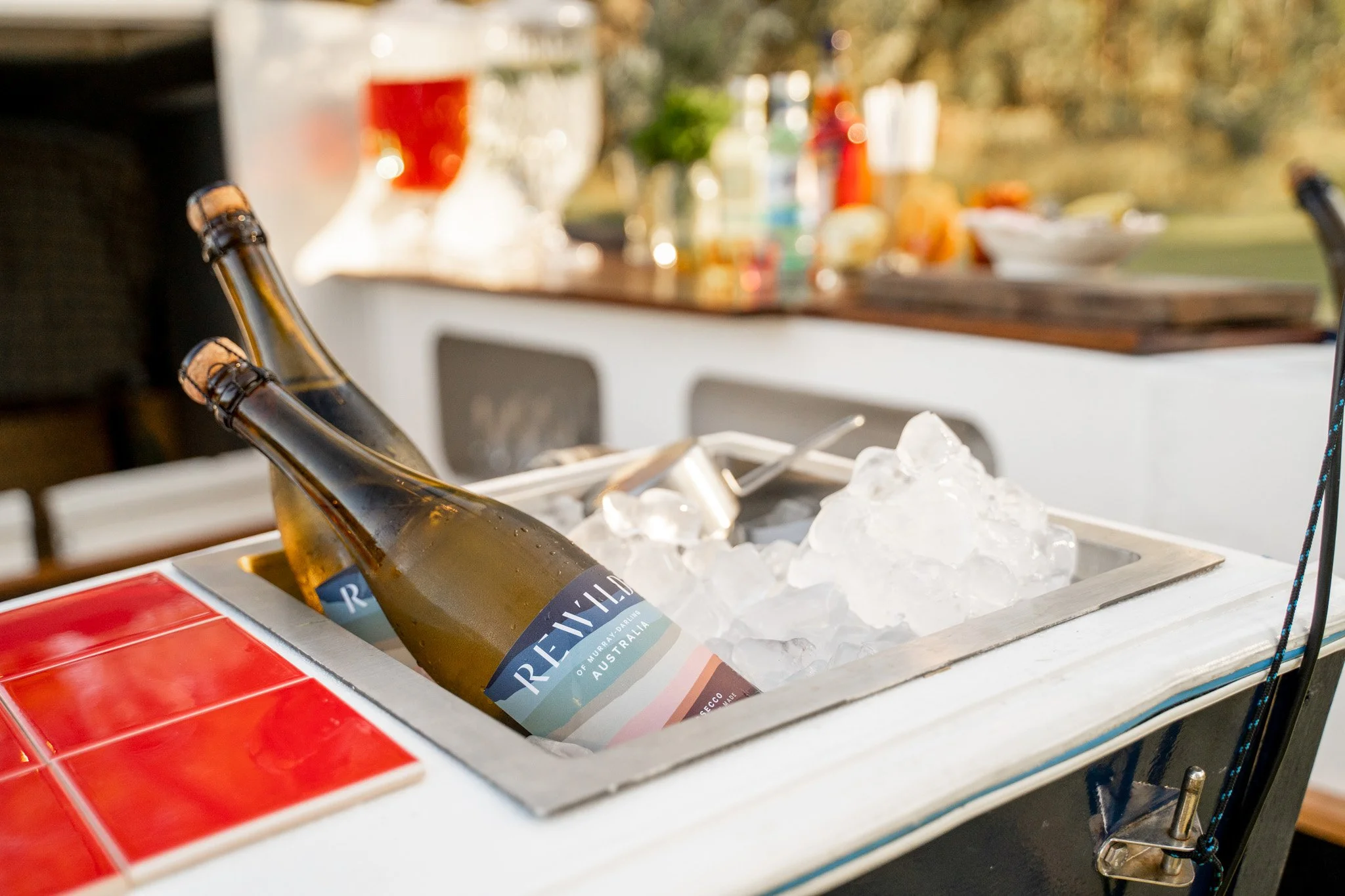 Champagne on ice in a mobile boat bar