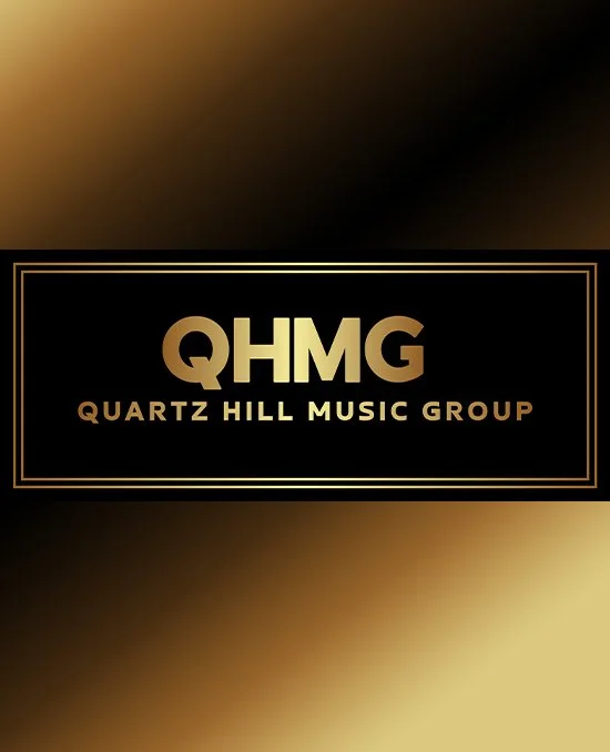 Gold and black promotional logo for Quartz Hill Music Group with the initials QHMG