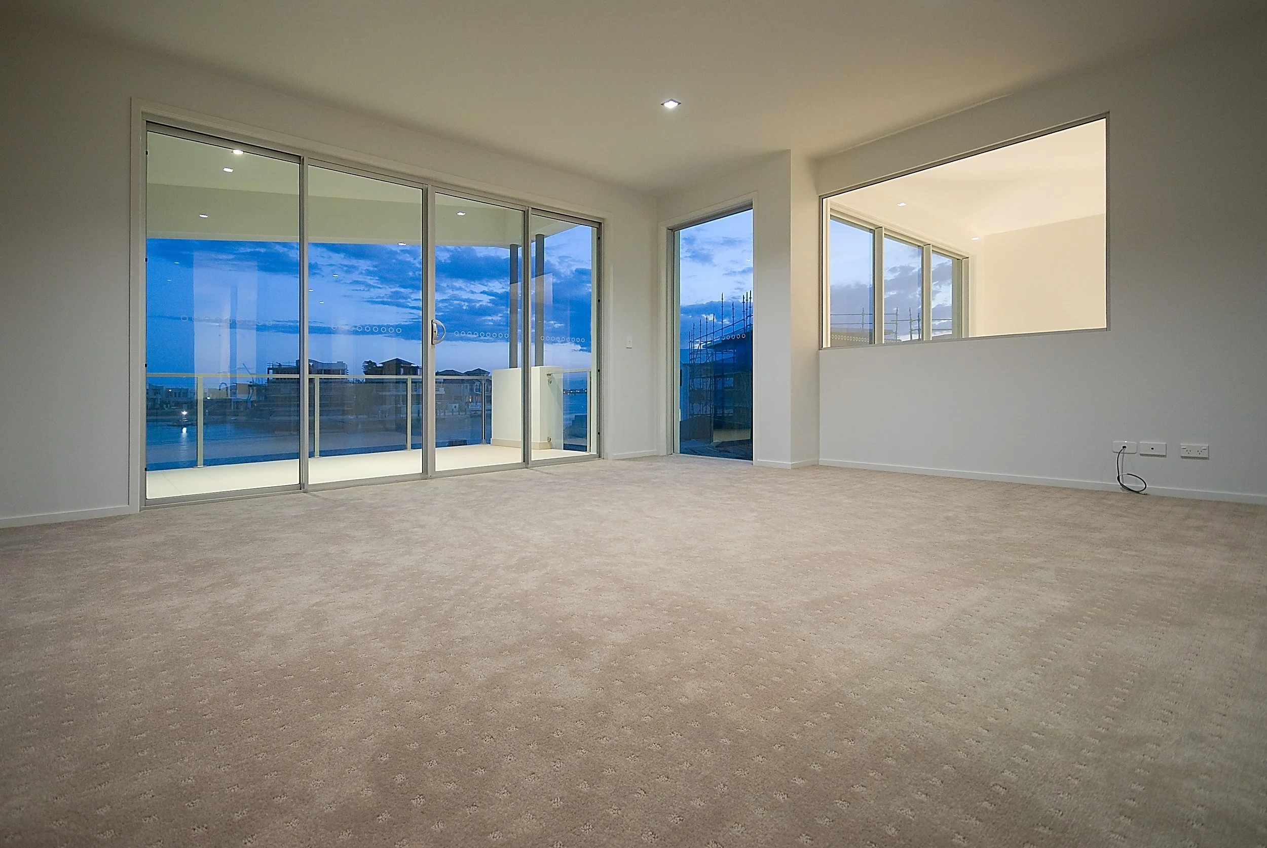 hampton-court-house-sovereign-island-18-upstairs-living-with-canal-view-jamie-gordon-architect.jpg