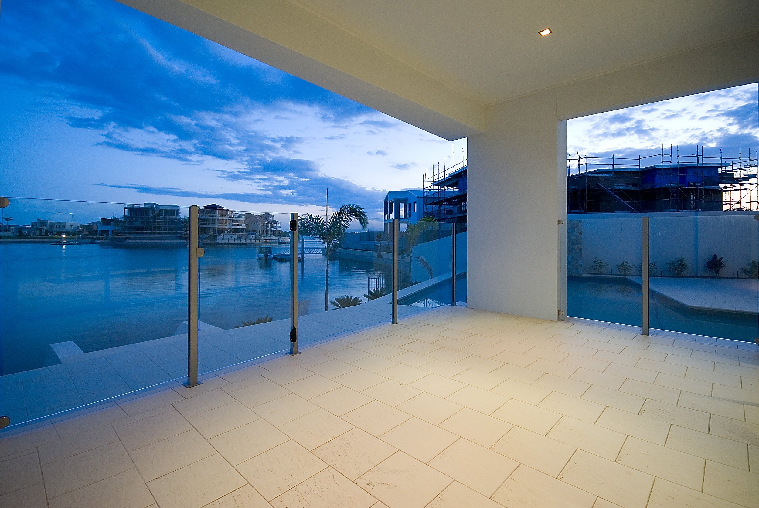 hampton-court-house-sovereign-island-16-covered-terrace-and-canal-view-jamie-gordon-architect.jpg