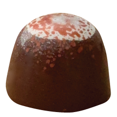 A dome-shaped dark chocolate bonbon with a glossy finish, decorated on top with a splattered design of red and white speckles fading into the surface.