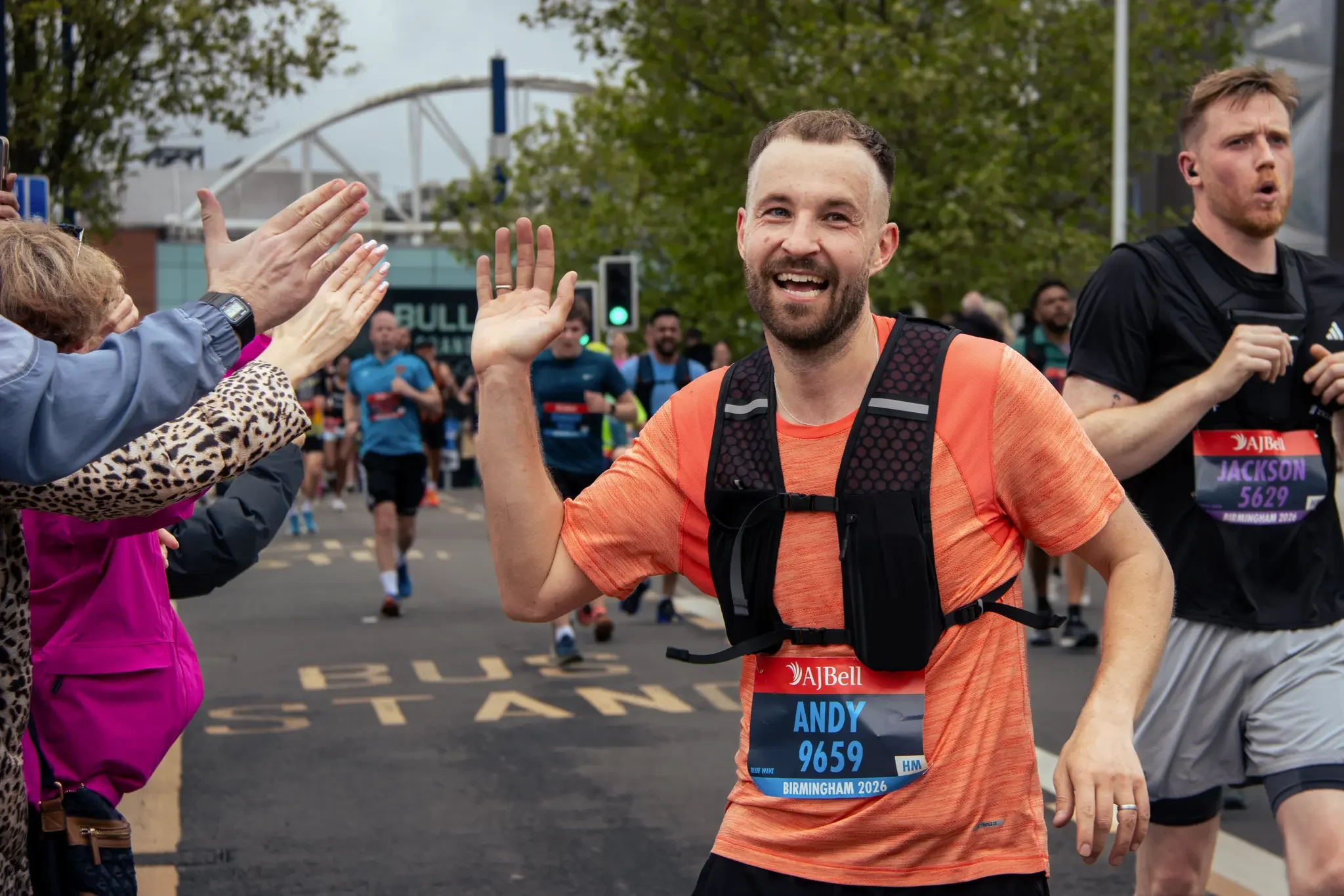half-marathon-runner-high-five-great-birmingham-run-birmingham.webp