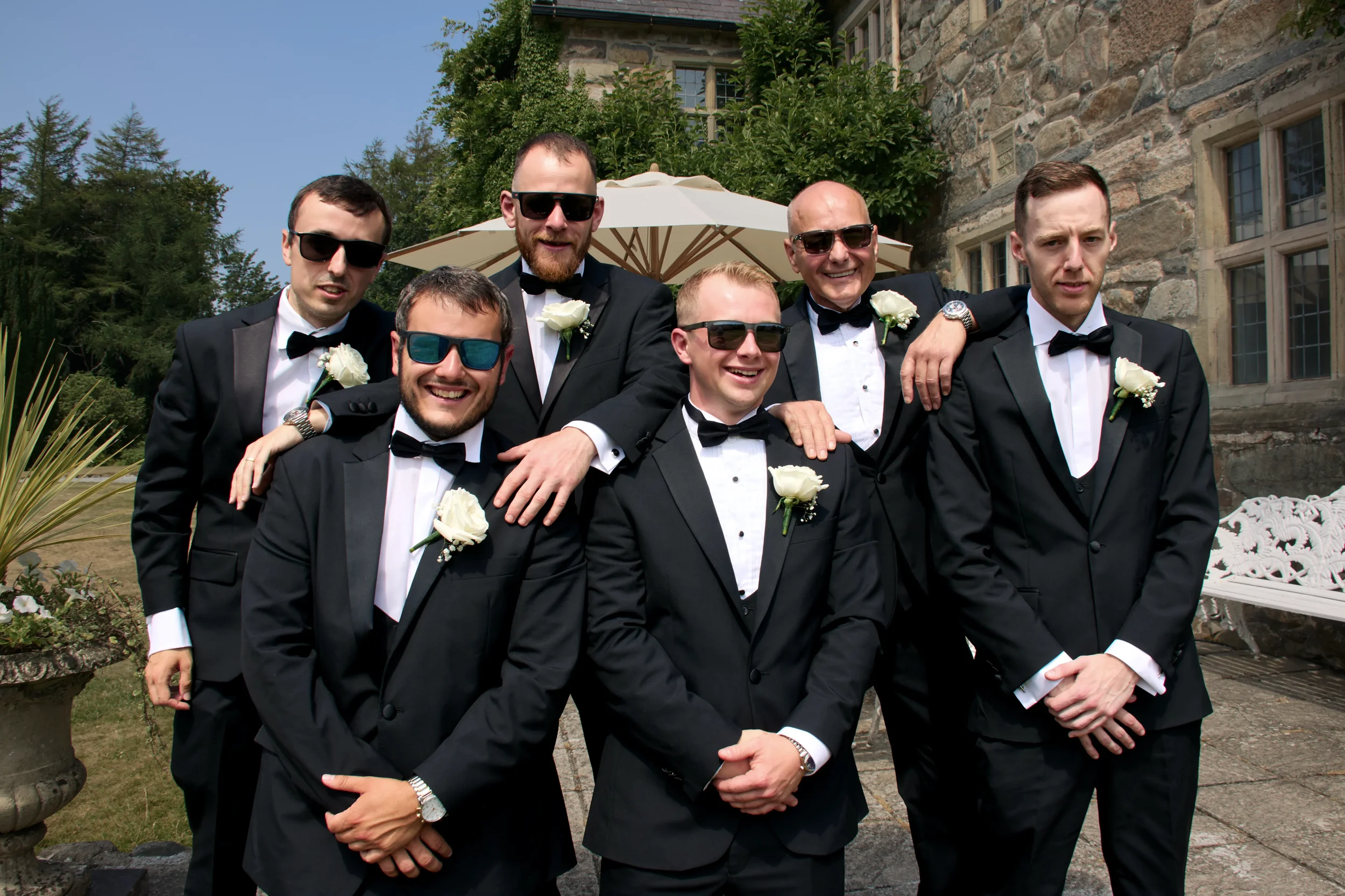 grooms-party-talhenbont-hall-wedding.webp