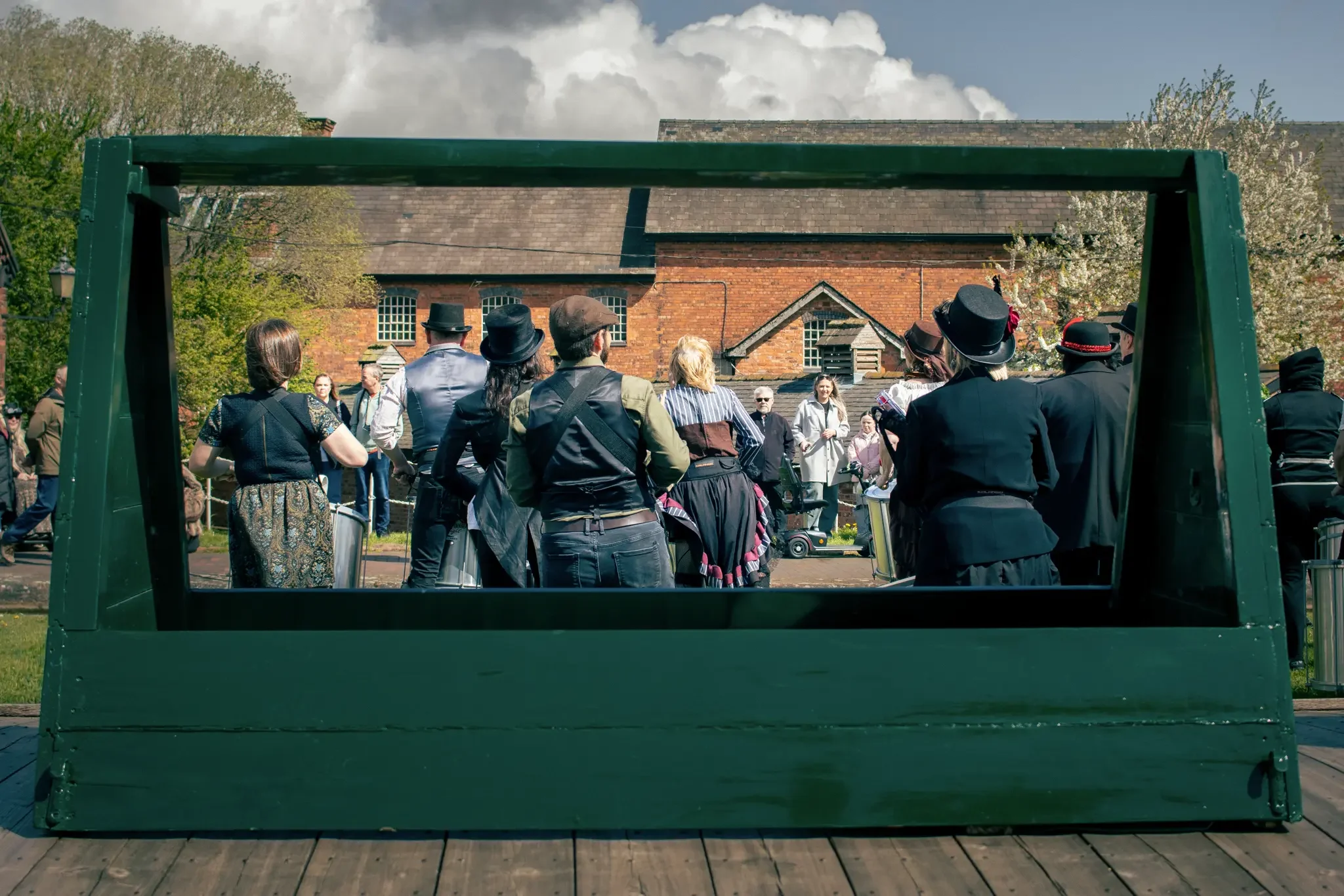 drummers-from-behind-steampunk-weekender-ellesmere-port-cheshire.webp