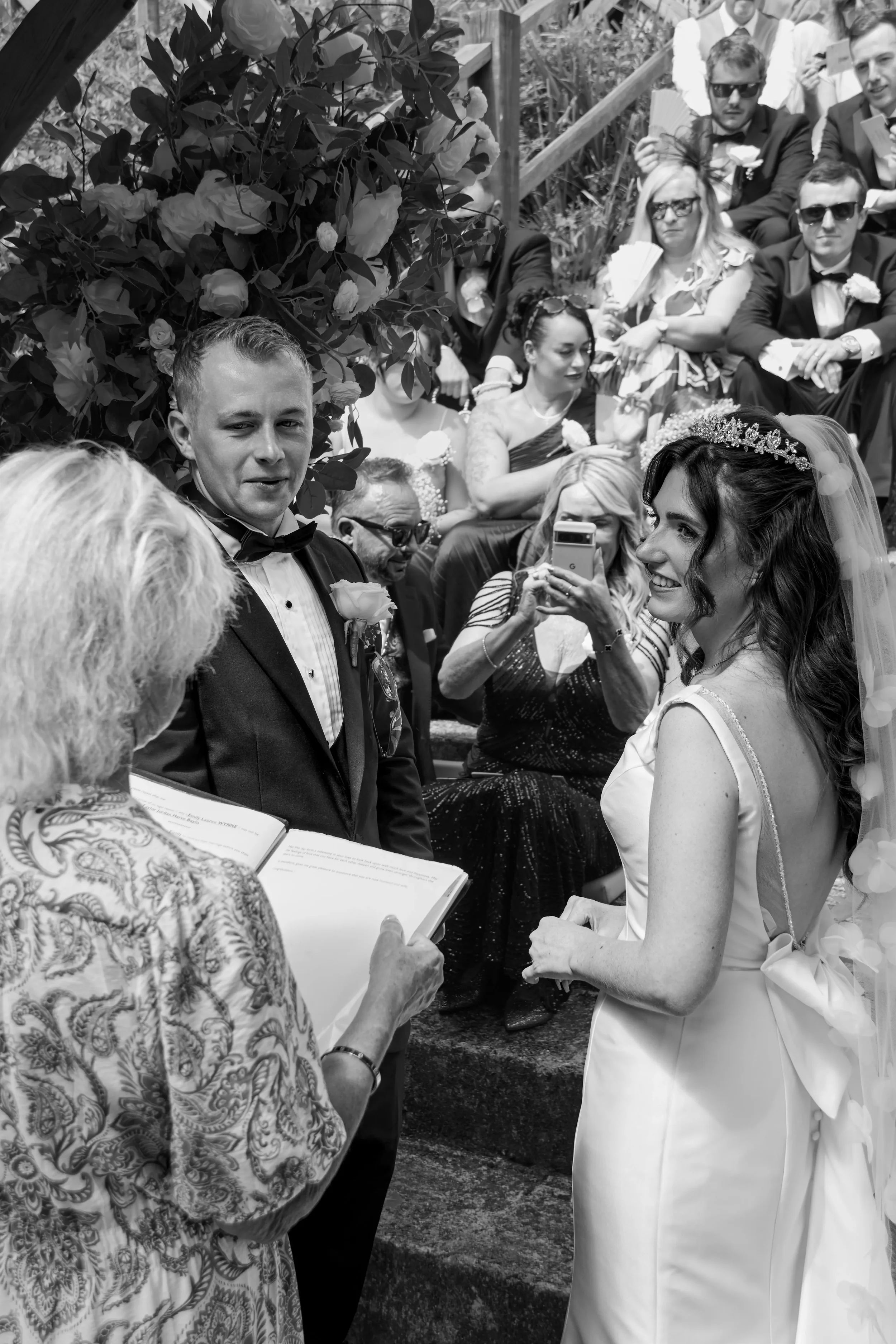 bride-and-groom-during-ceremony-talhenbont-hall-wedding.webp