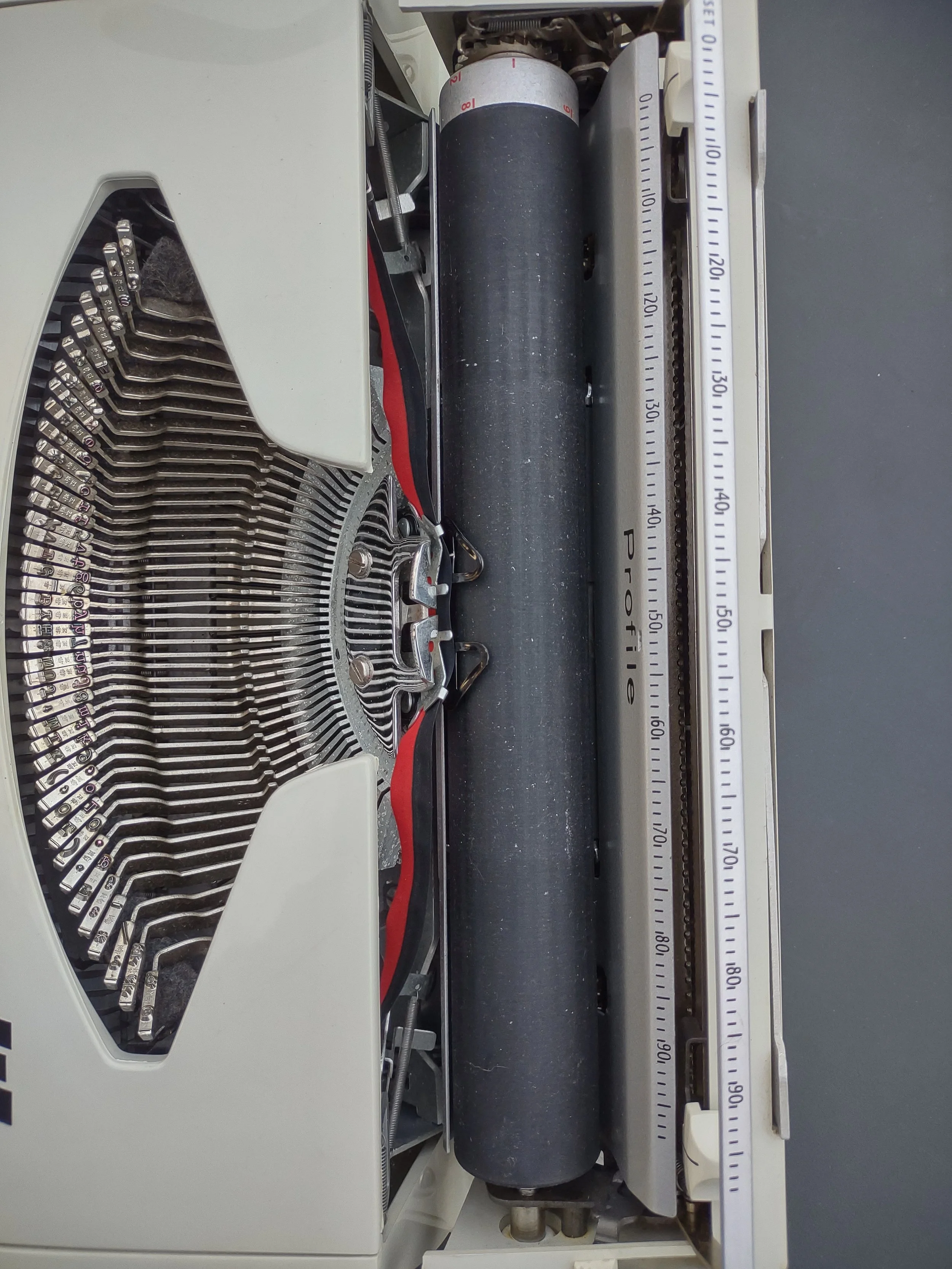 Smith-Corona Profile portable typewriter, platen and type basket area