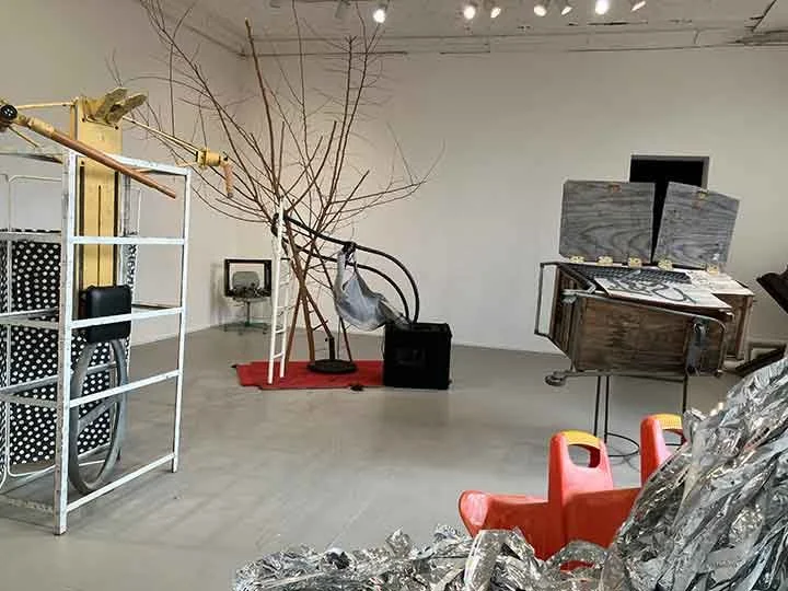 PS1 The Gatherers installation featuring stacked found objects, reflecting on waste and accumulation. Photographed by Le Xi奚乐.