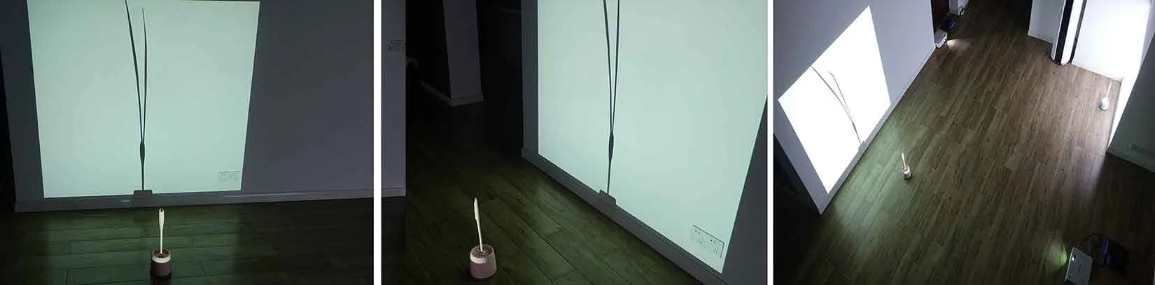 Three selected frames from the video installation artwork Blue Long Grass (Year) by Le Xi, showing projected animation and ready-made objects interacting through kinetic rhythms