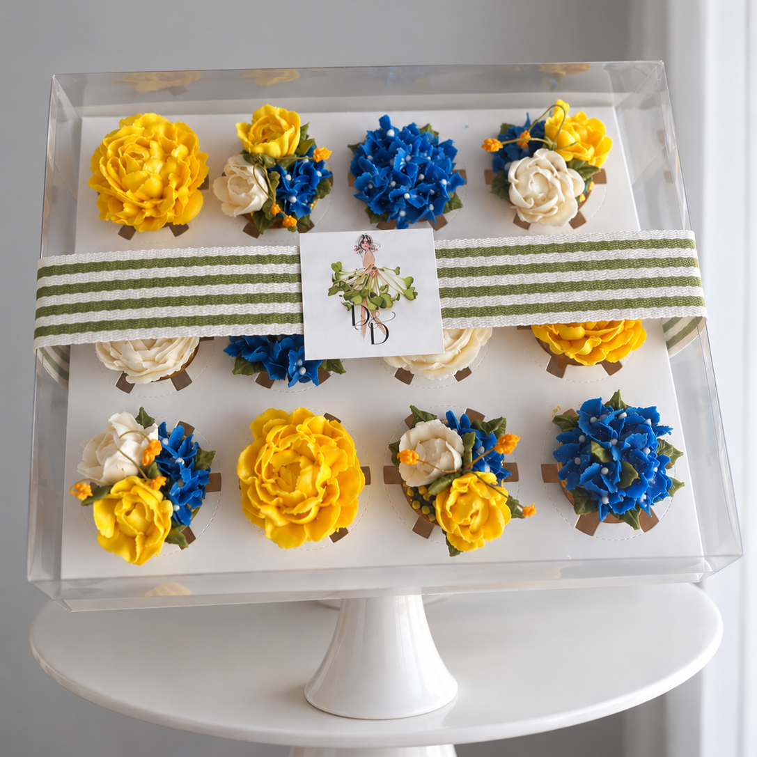 Floral+Cupcakes+on+a+White+Pedestal.png