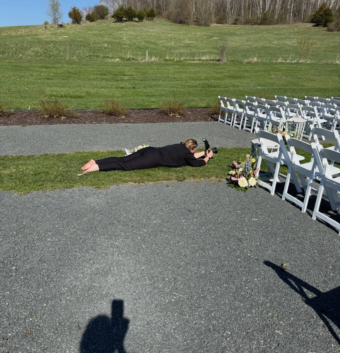 Not me flat on the grass, in the aisle, chasing dreamy detail shots! 🫣🩷

There&rsquo;s always a moment where I look a little ridiculous&hellip; and this was one of them 😅

Flat on the ground, dress flowing just right, florals perfectly placed, try