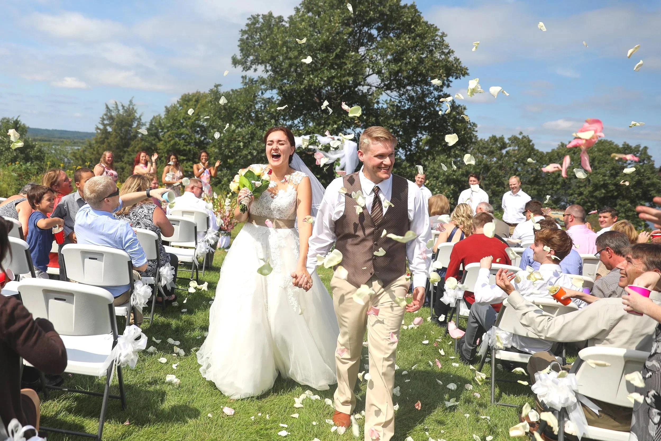 Minnesota wedding couple full of joy as the walk down the aisle after their vows