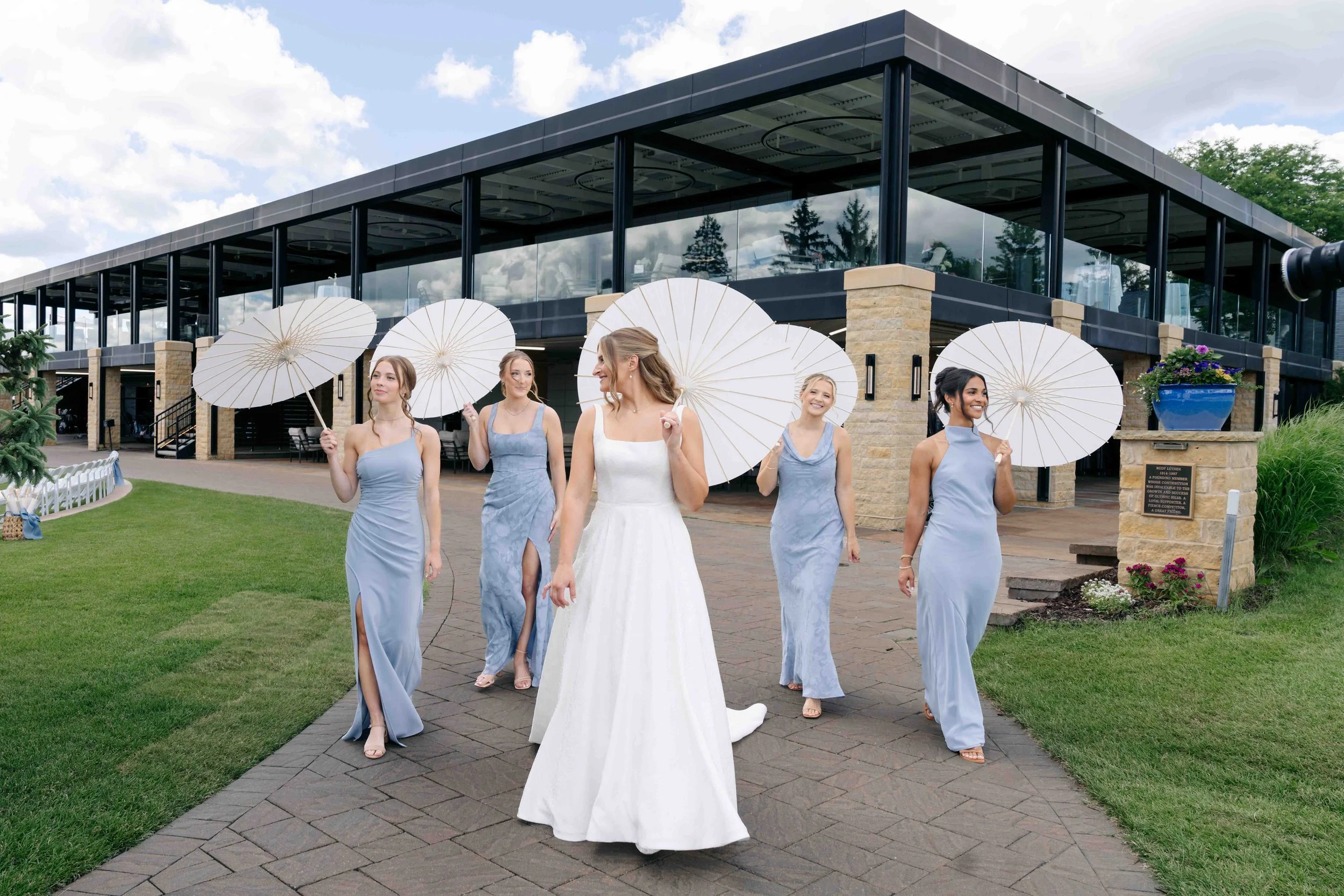 Abby-Bridesmaids-Umbrellas-Walking-1.JPG