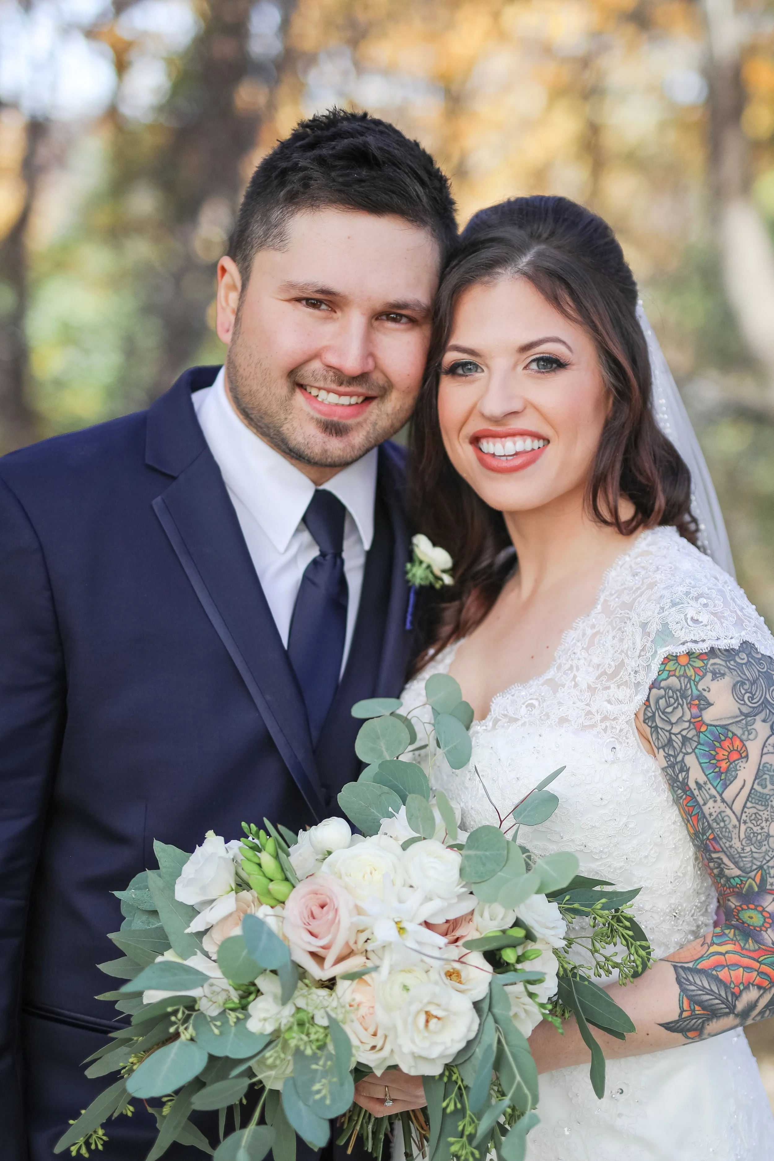Bride and groom in the fall in Minnesota, photographed by LKW Photography, a Minnesota based wedding photographer.