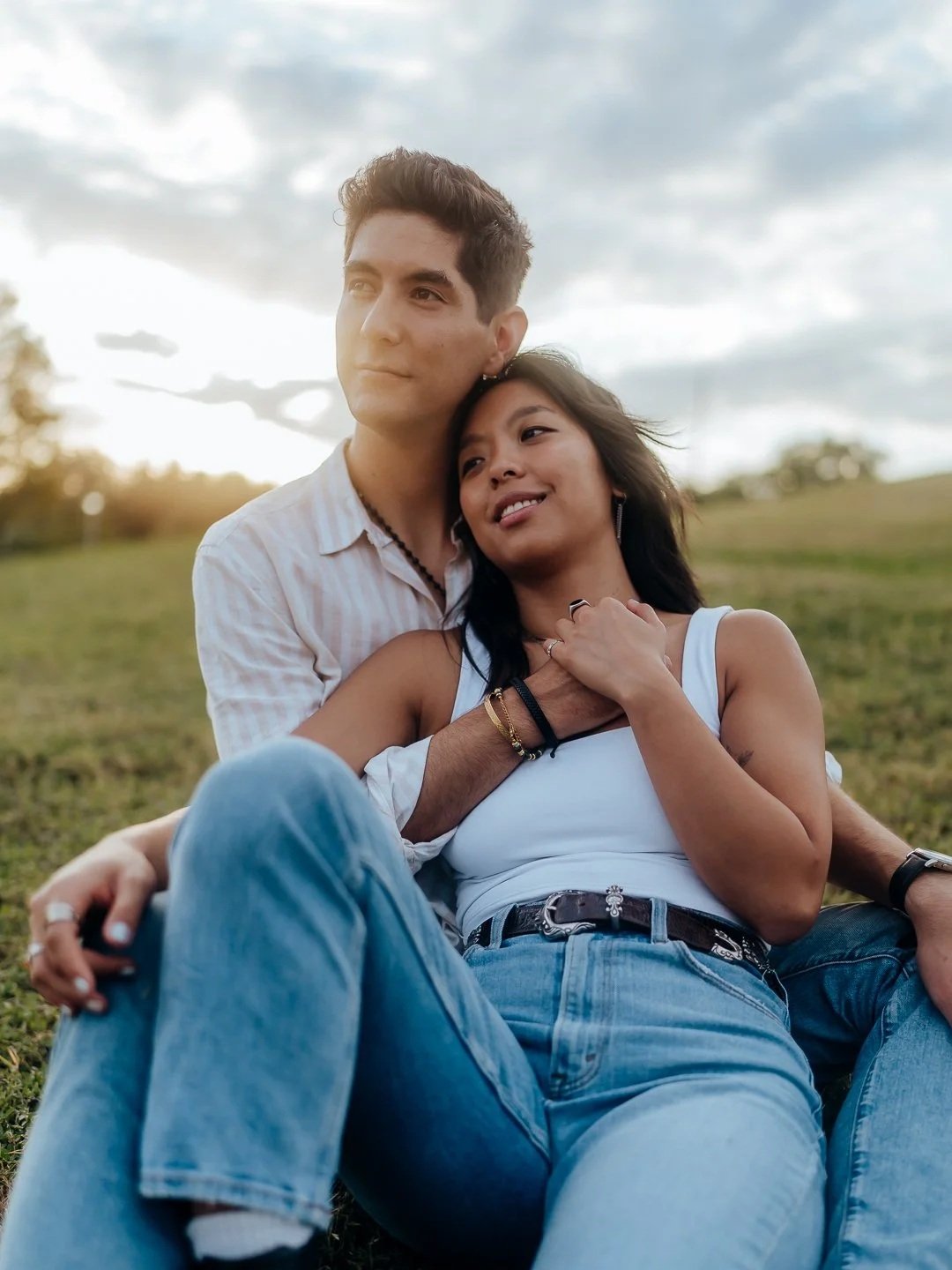 Couple taking engagement photos in Austin, Texas. Weddings, Engagements, Elopements, Portraits, Headshots, and Family Photoshoots. Romantic, and Cinematic.