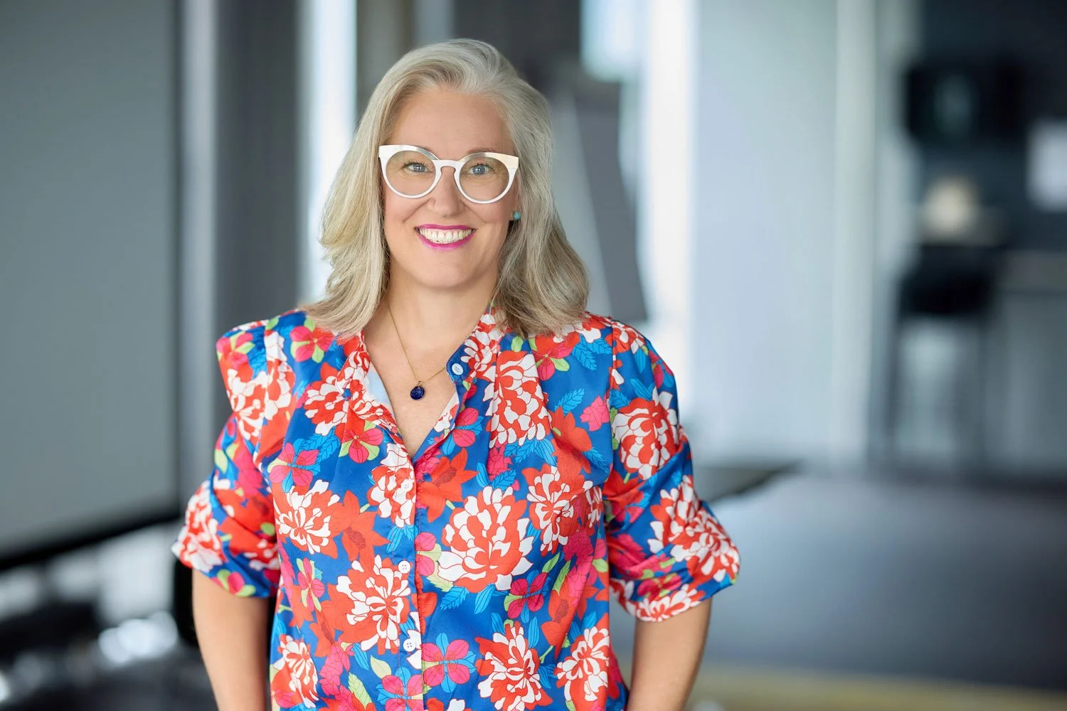 Traci Ruble standing in her psychotherapy office where she works with couples and individuals