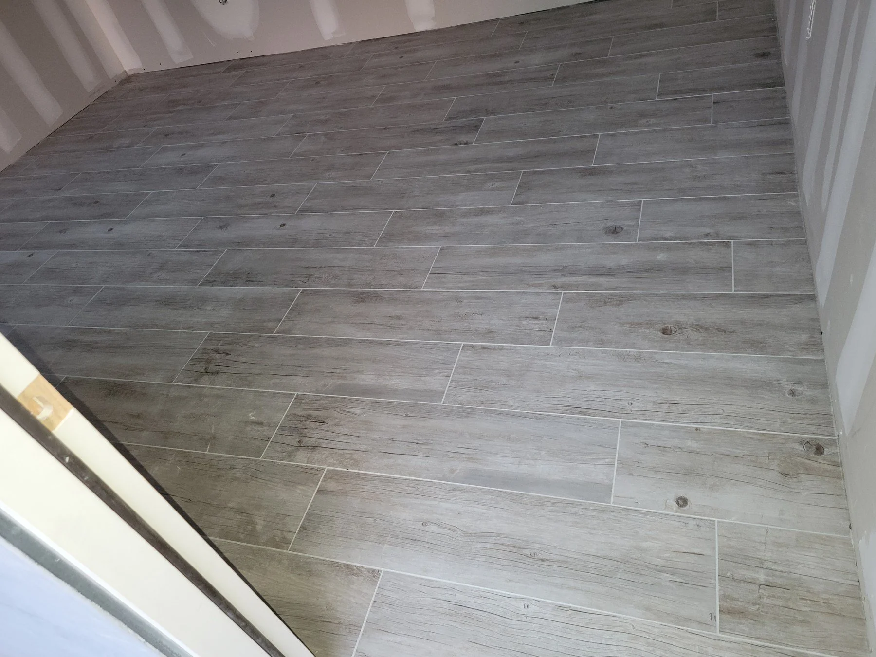  Tile &amp; Stone Installation   Ceramic, porcelain, marble, travertine, limestone, and granite tile for floors, walls, and kitchen backsplashes. Careful layouts, cuts, grout, and edge details.   Explore Floor Tiles → 