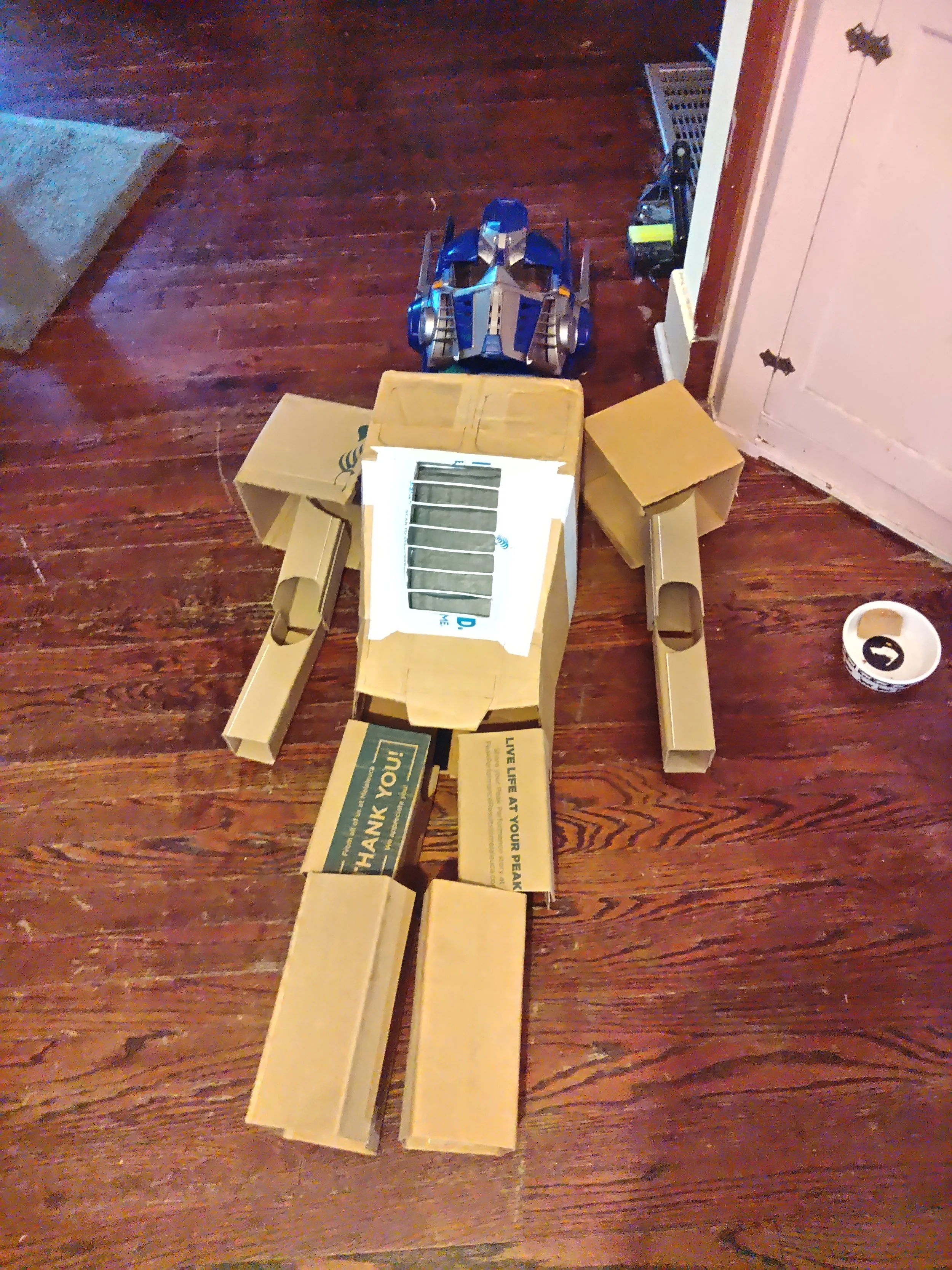 My son wanted to be a "robot" because of the mask. This was mostly painted cardboard.