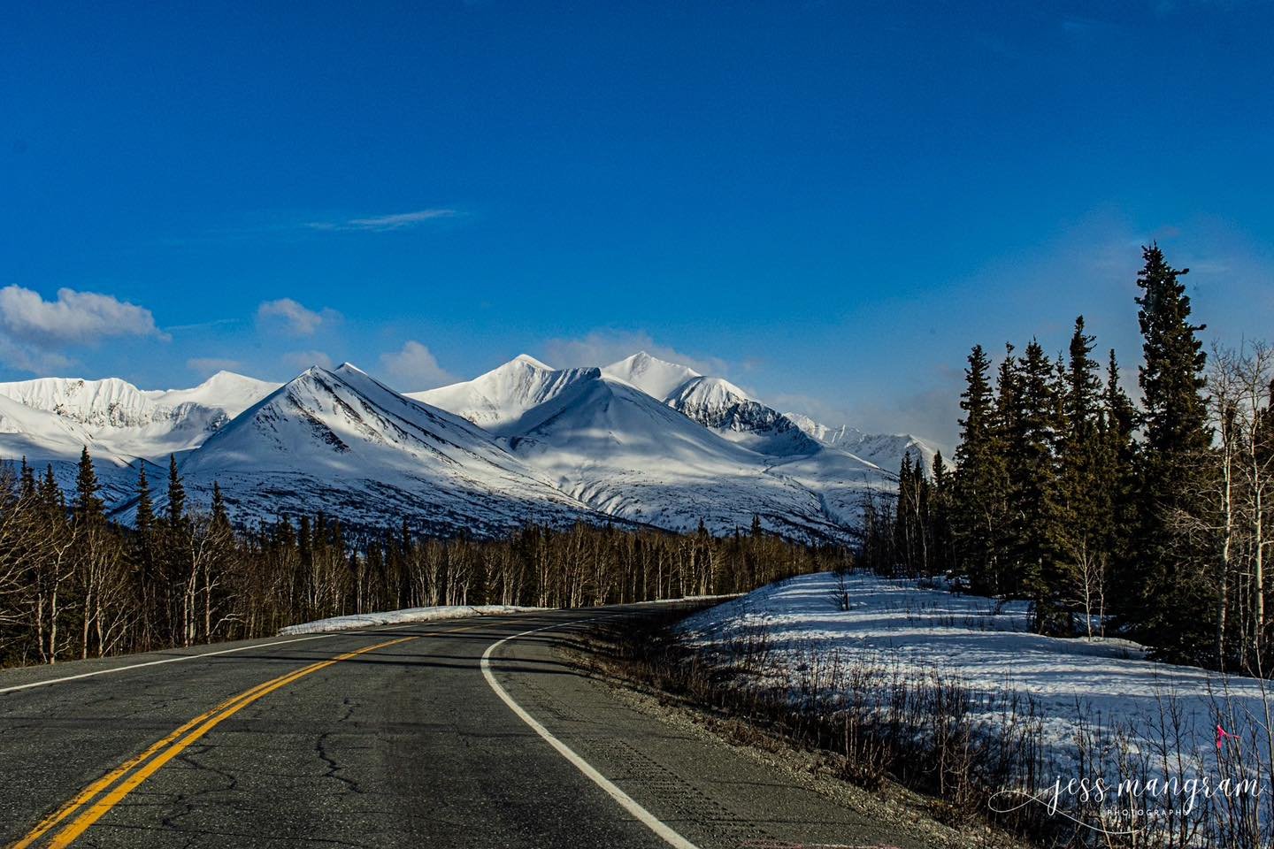 I love driving in Alaska. The shadows and the little streaks of light in the mountains are truly a spectacle to behold.