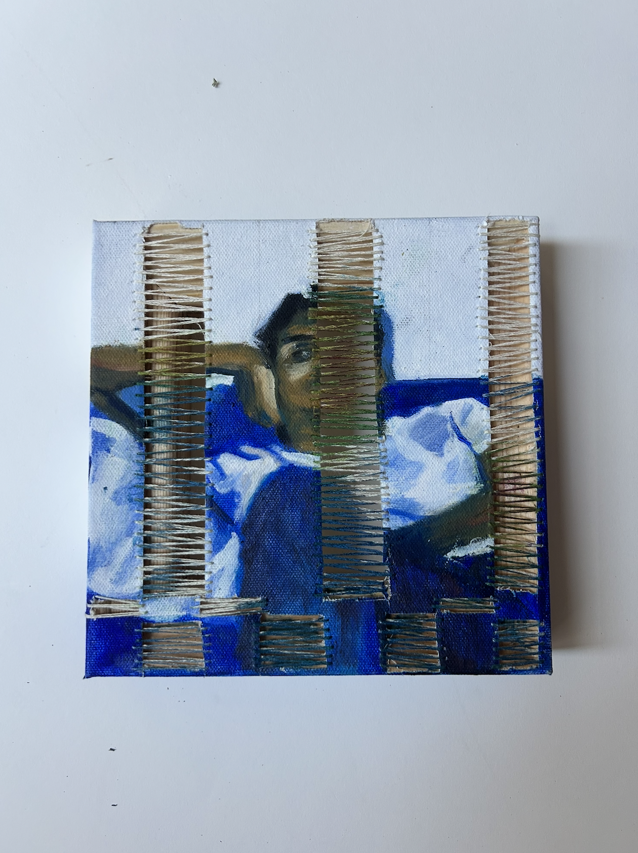 Fraternal Twin 2, 2026, oil on canvas with silk string and silk dye, 8x8"