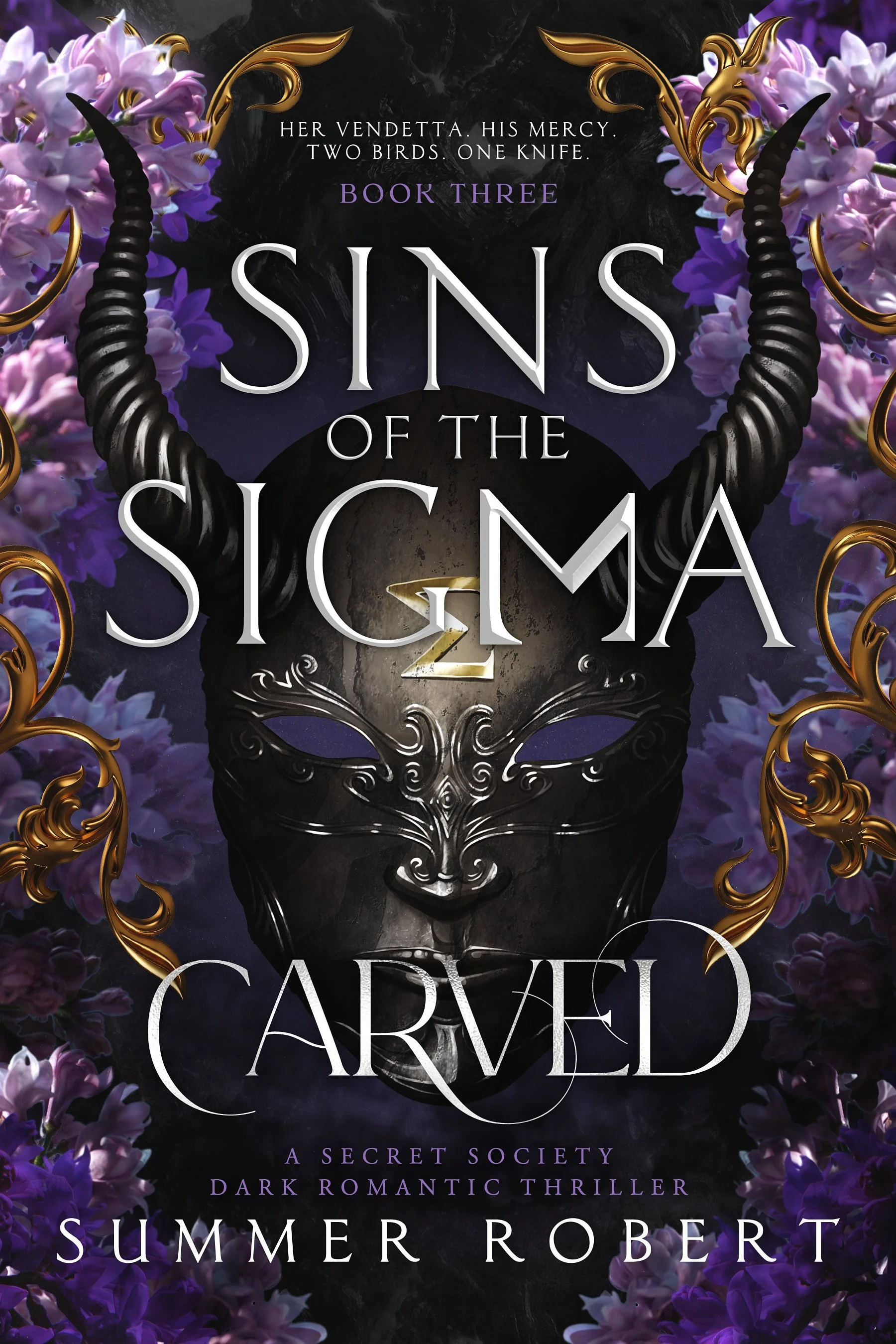 Carved, Sins of the Sigma, Book 3 by Summer Robert, a dark romantic thriller. This cover features a black, horned mask with a Sigma symbol on the forehead. It features purple flowers and golden filigree.