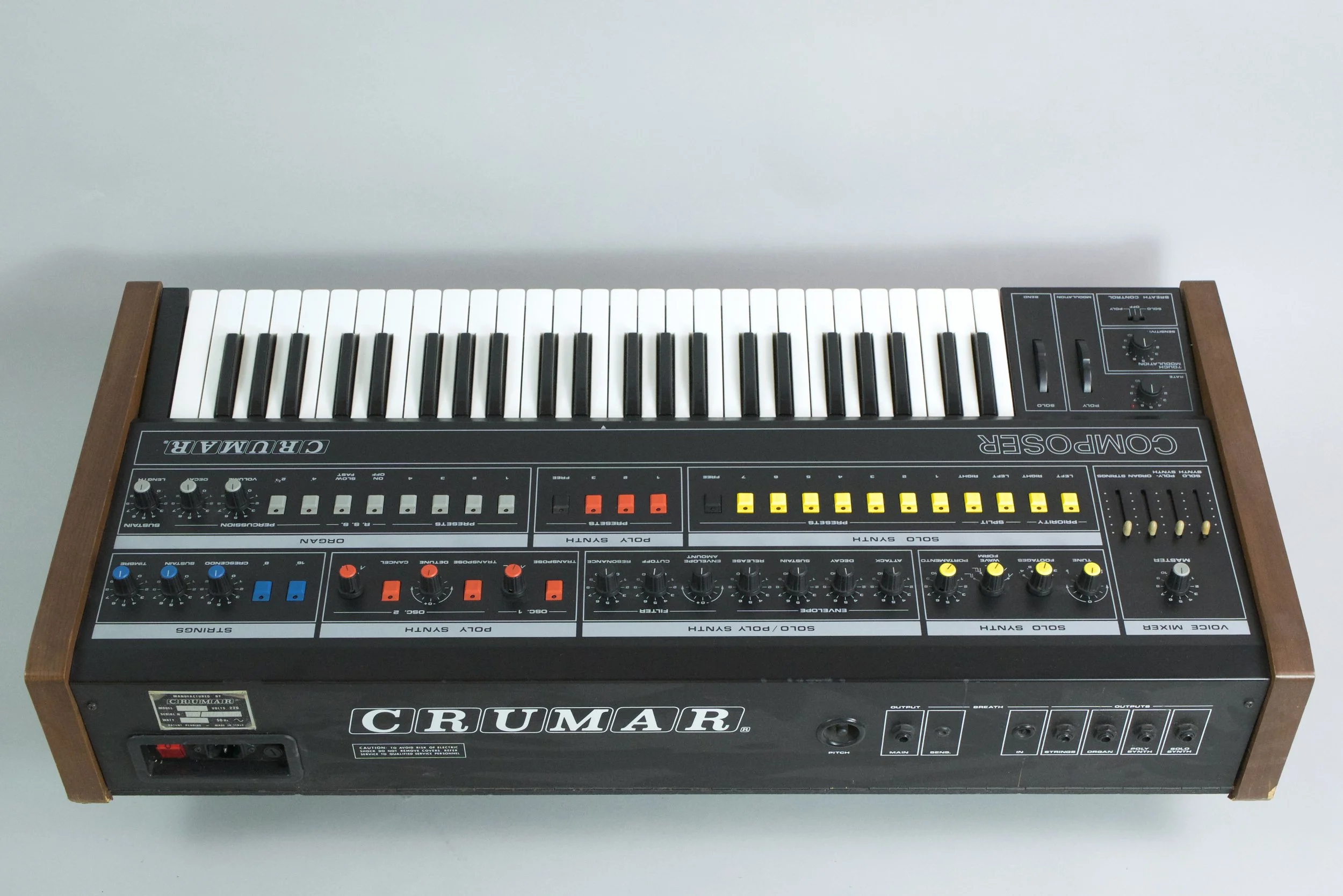 The two jog wheels are for vibrato depth for all sections except the monophonic synth, while the other jog wheel is for pitch bending affecting the mono synth. 
The Crumar Composer is also equipped with an expressive key bed : "jiggle" a key sideways