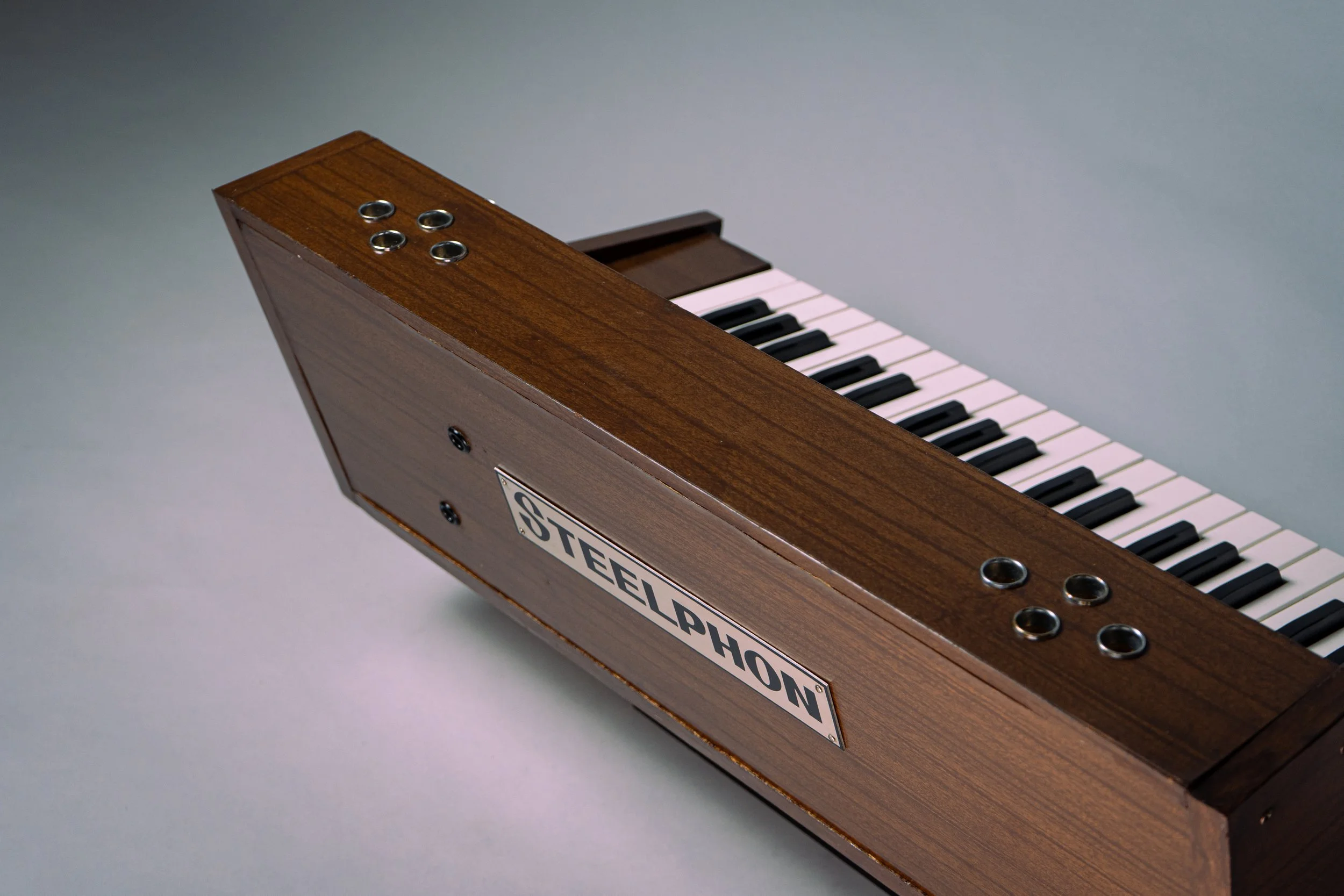 The design is compact and particular, with an odd tilt backward that we've never really seen before. The vents on top are found on the S900 as well. 