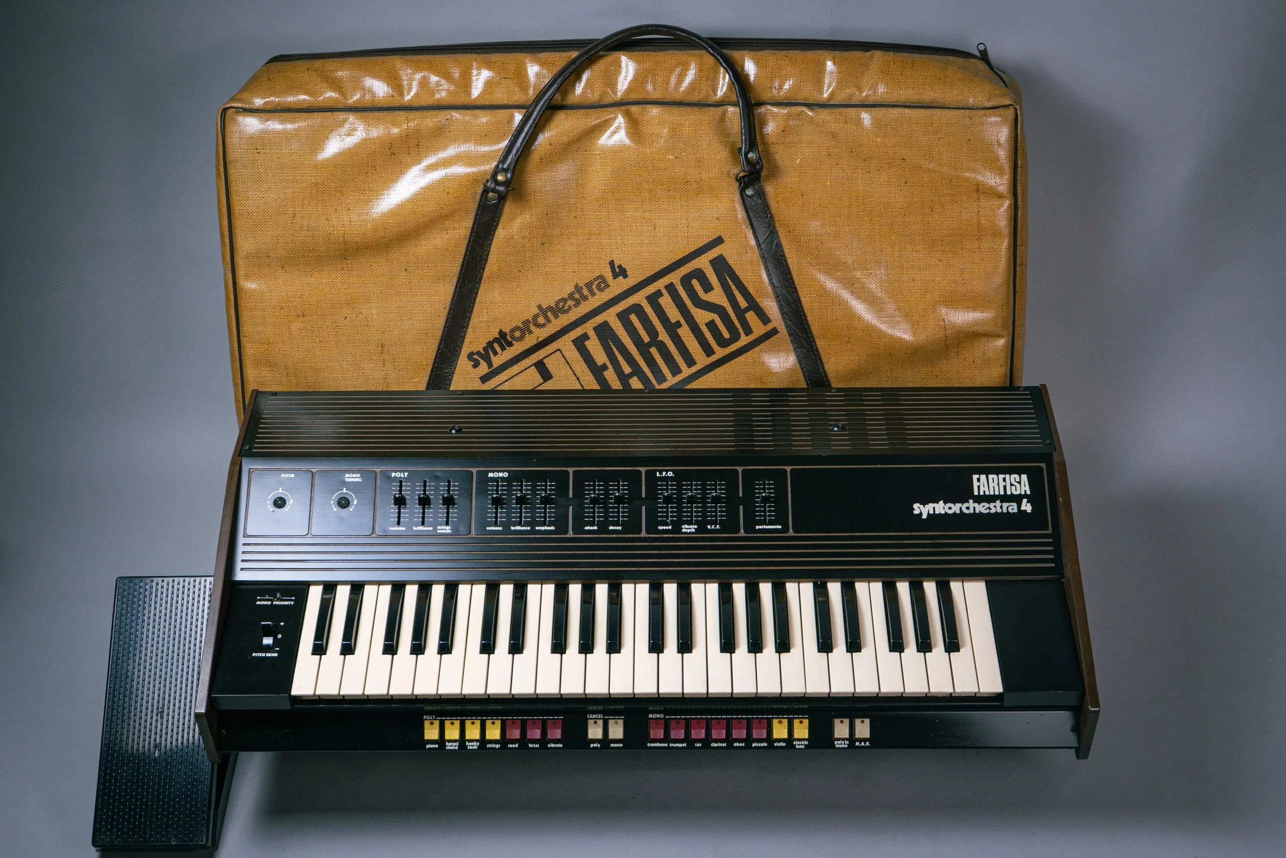 FARFISA SYNTORCHESTRA 4 - 1982. A gorgeous and compact polyphonic and monophonic combo machine with strings and brass presets and a synth section armed with delicate flute leads. 