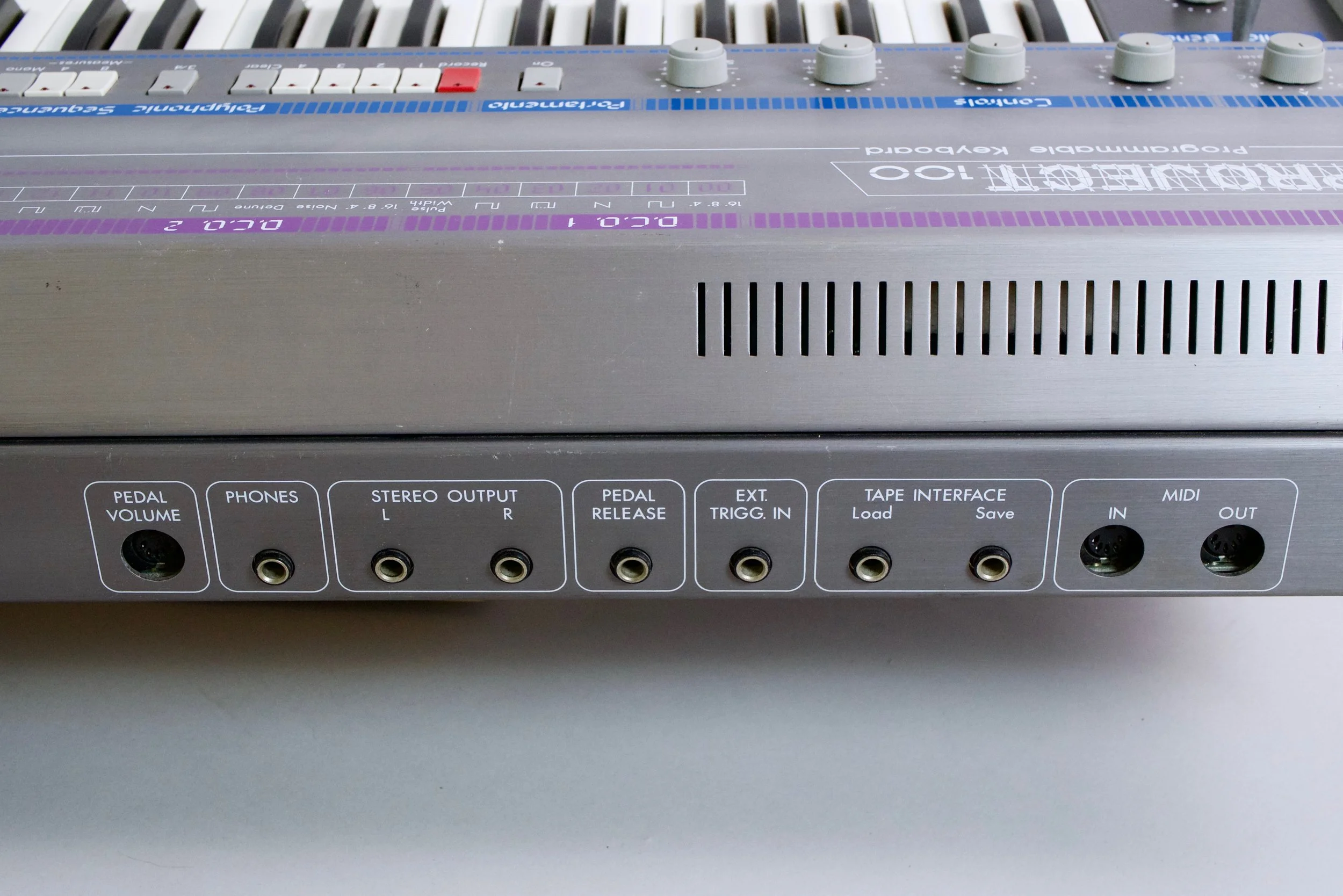 Stereo outputs and Midi In and Out is the take-away looking in the back, with pedal connectors for volume and release. There's also a trigger input and a Phones output. 