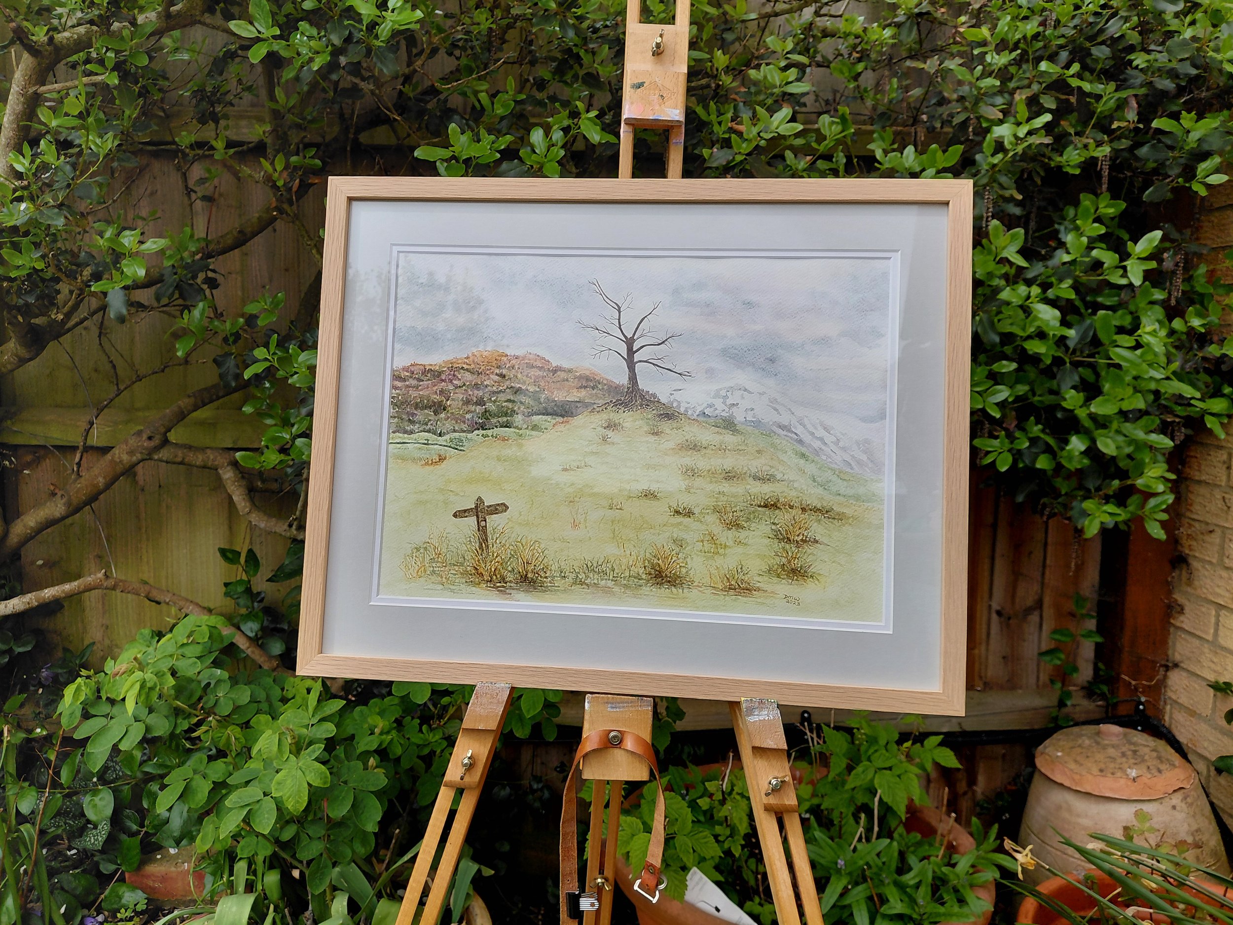Cumbria Signpost Series 1 - Lone Tree. Watercolour,  15 x 18.5”, finished size. Framed: light wood with grey mount