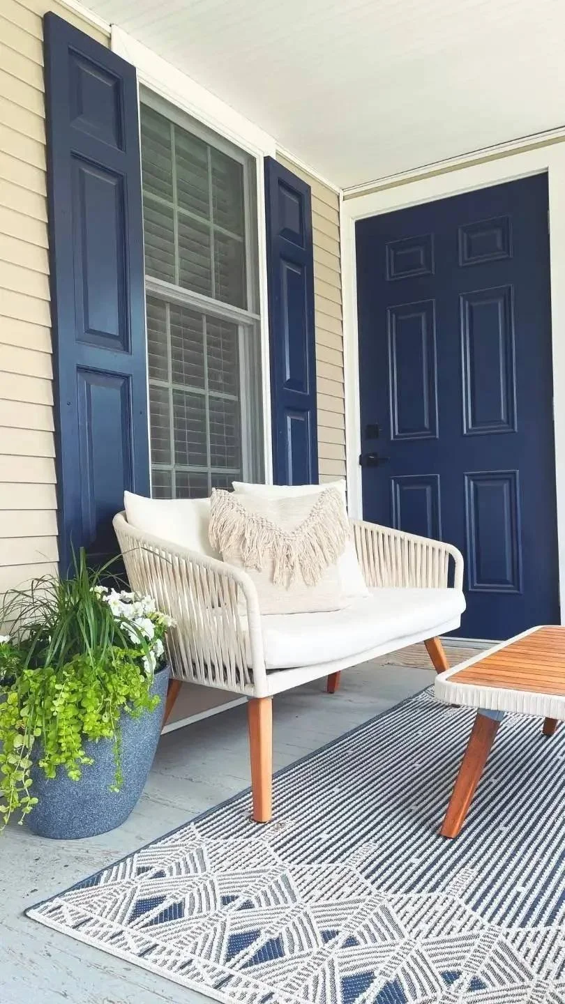 A which couch rests outside of the Reset Plymouth office on the porch.