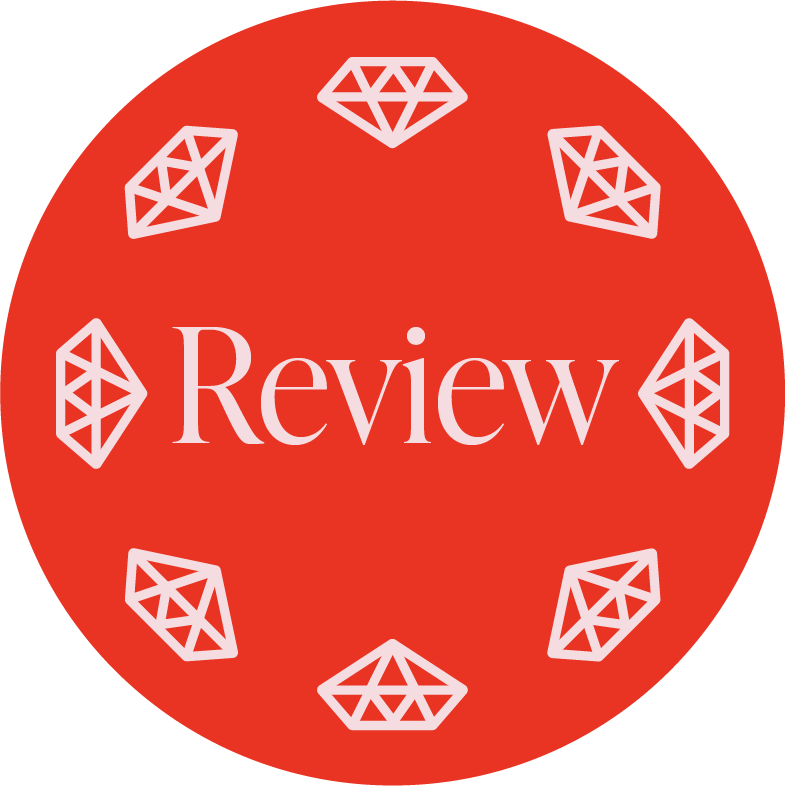 A red circular badge with the word 'Review' in the center and outlines of diamonds around the border.