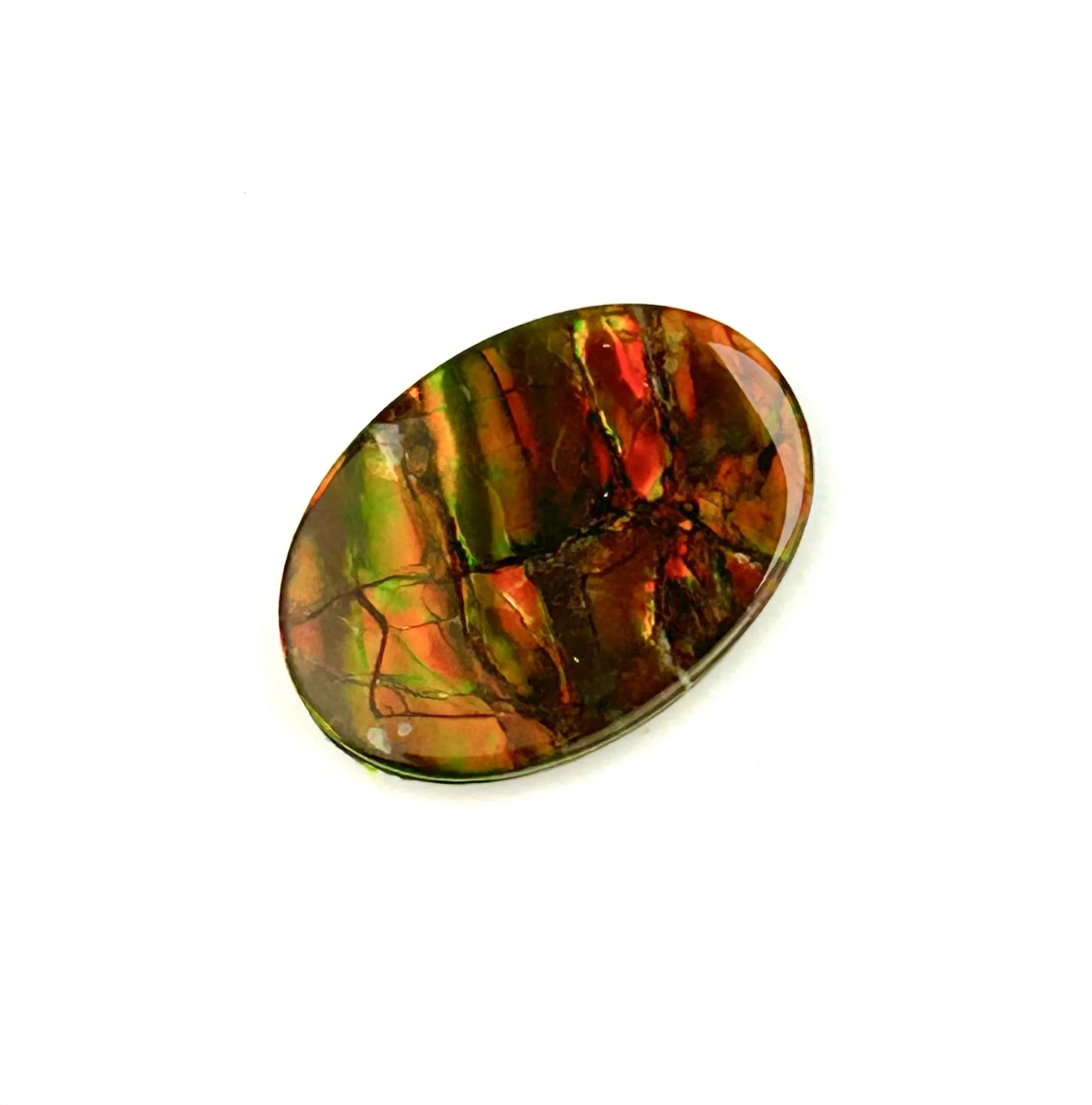 oval ammolite cabochon with red and gold colors