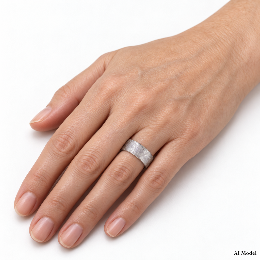 Silver handmade band on hand